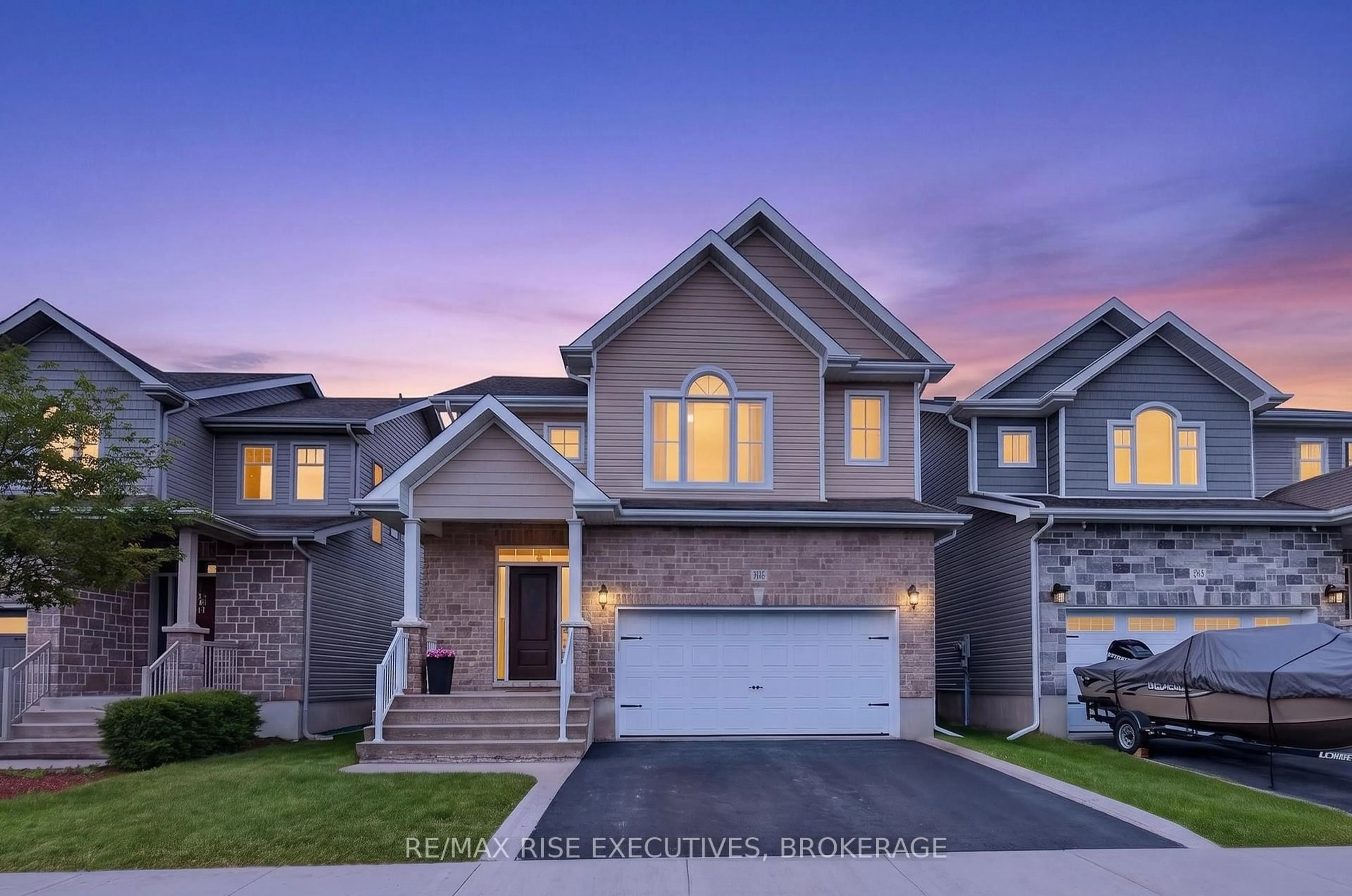 Home with brick exterior material, street for 909 Edward Riley Dr, Kingston Ontario K7P 0E3