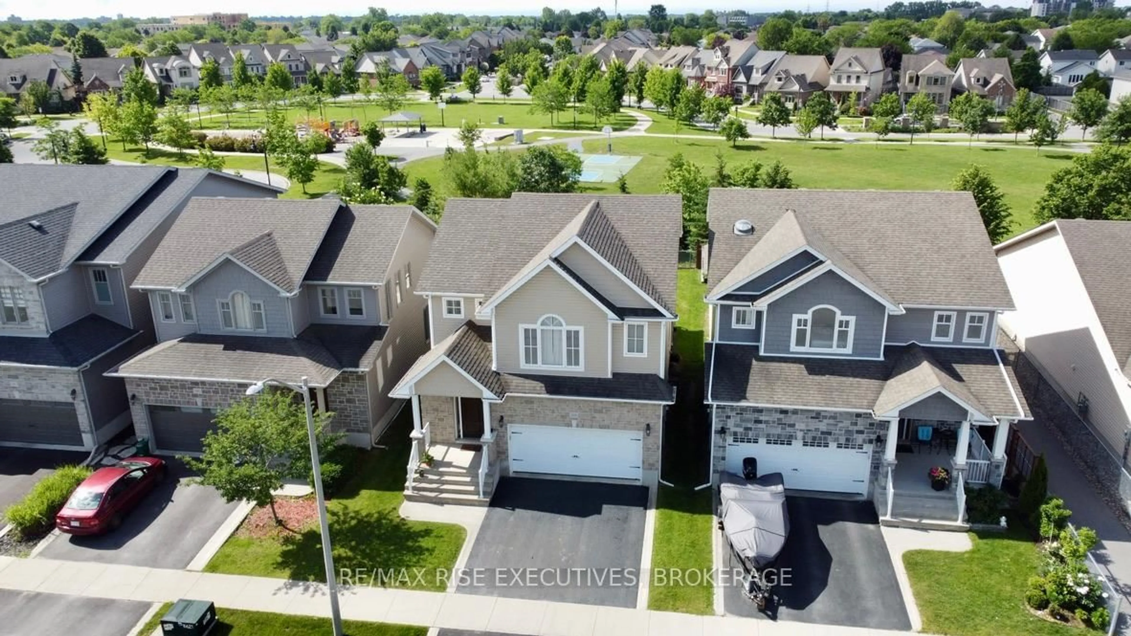 A pic from outside/outdoor area/front of a property/back of a property/a pic from drone, street for 909 Edward Riley Dr, Kingston Ontario K7P 0E3