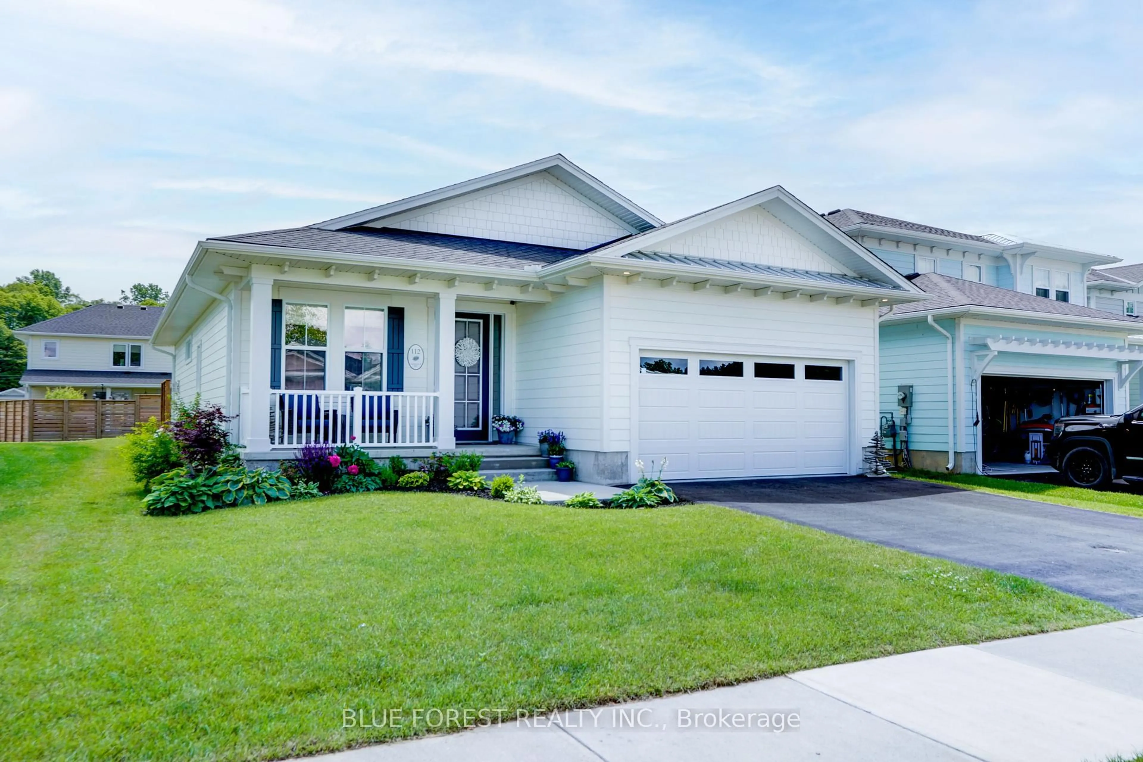Home with vinyl exterior material, street for 112 Sandcastle Key, Central Elgin Ontario N5L 1C5