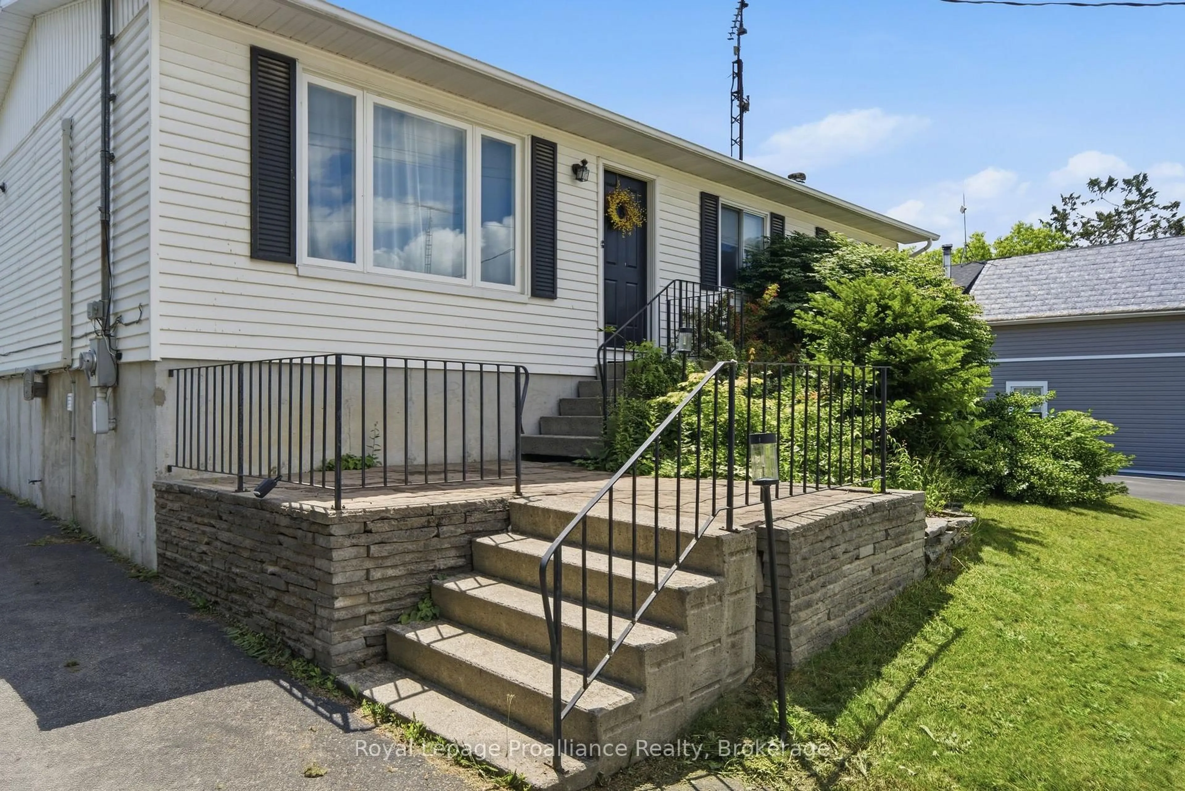 Home with vinyl exterior material, street for 429 County Rd 19 Rd, Prince Edward County Ontario K0K 1A0