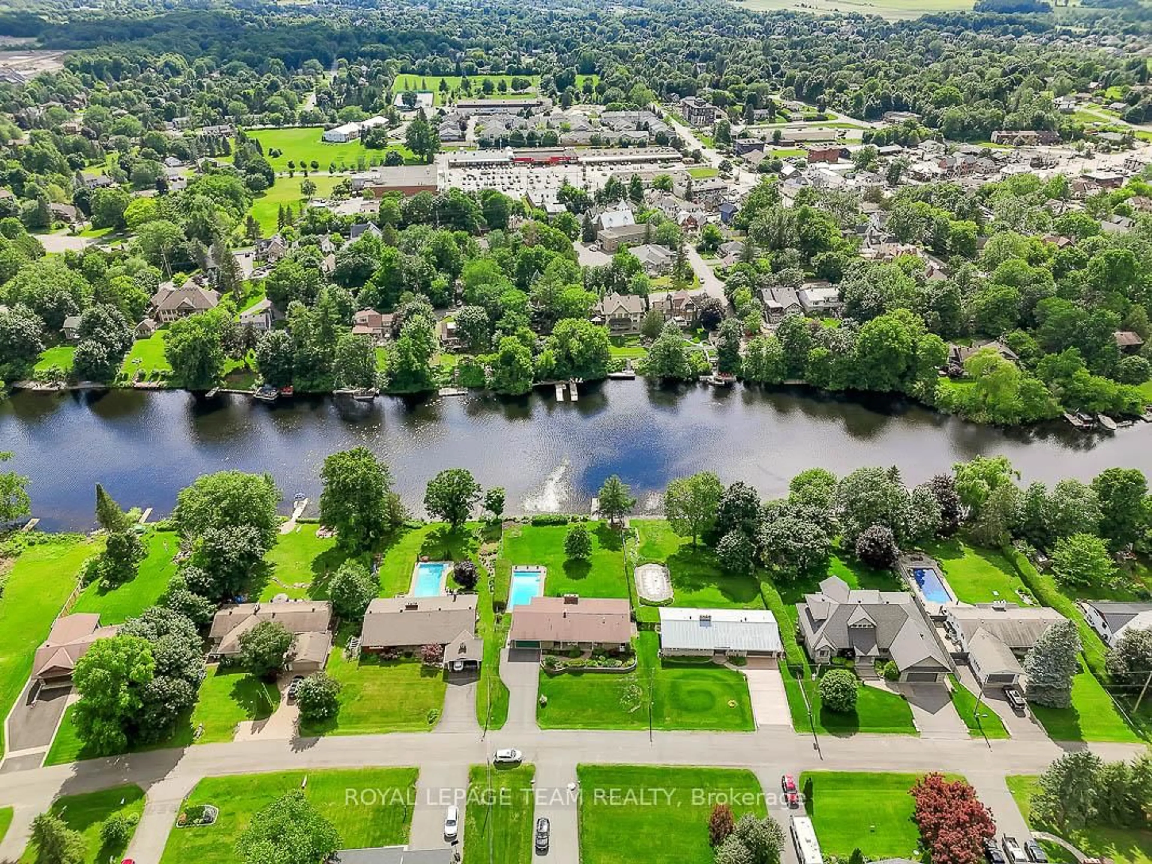 A pic from outside/outdoor area/front of a property/back of a property/a pic from drone, water/lake/river/ocean view for 5576 South River Dr, Manotick Ontario K4M 1J4