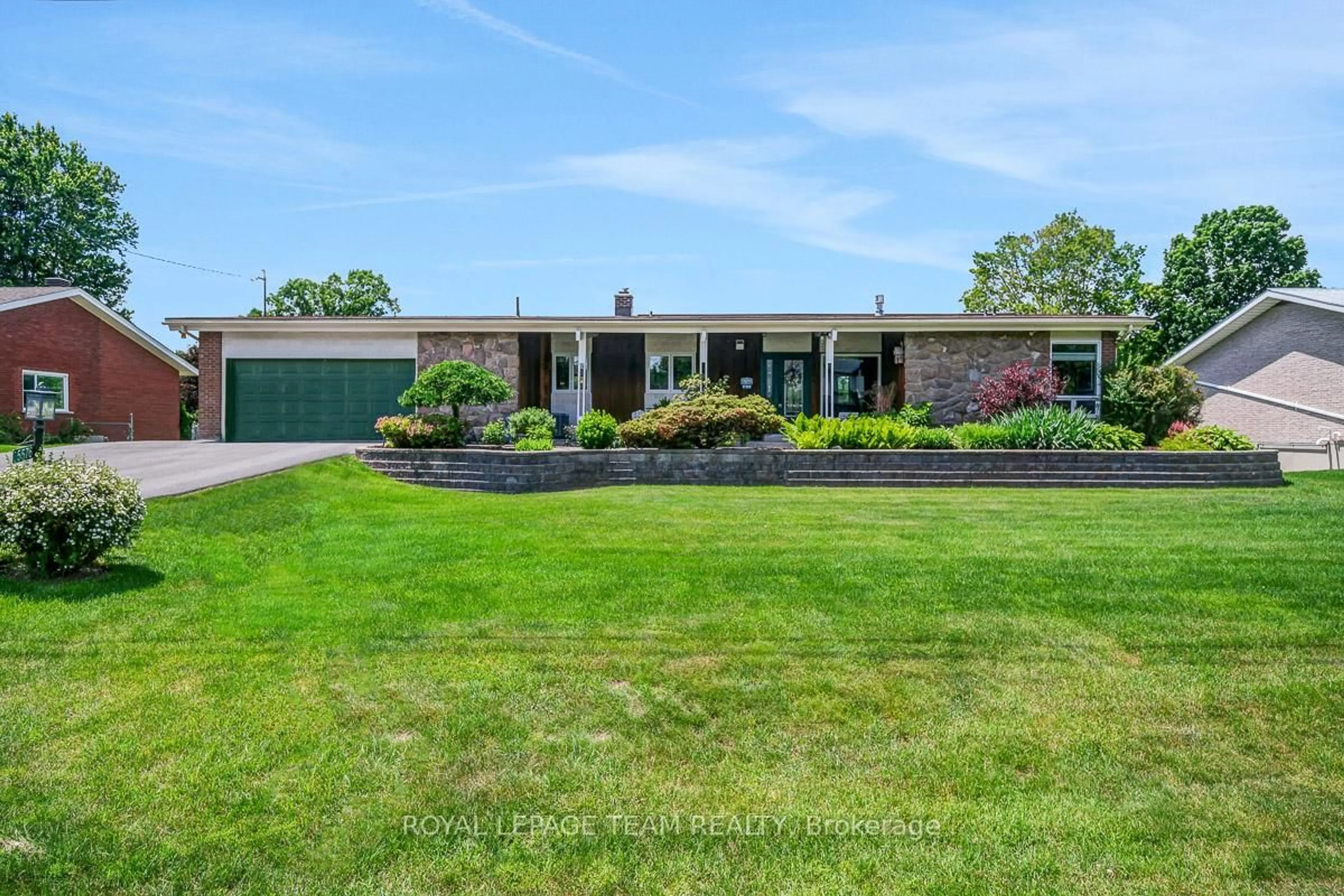 A pic from outside/outdoor area/front of a property/back of a property/a pic from drone, water/lake/river/ocean view for 5576 South River Dr, Manotick Ontario K4M 1J4