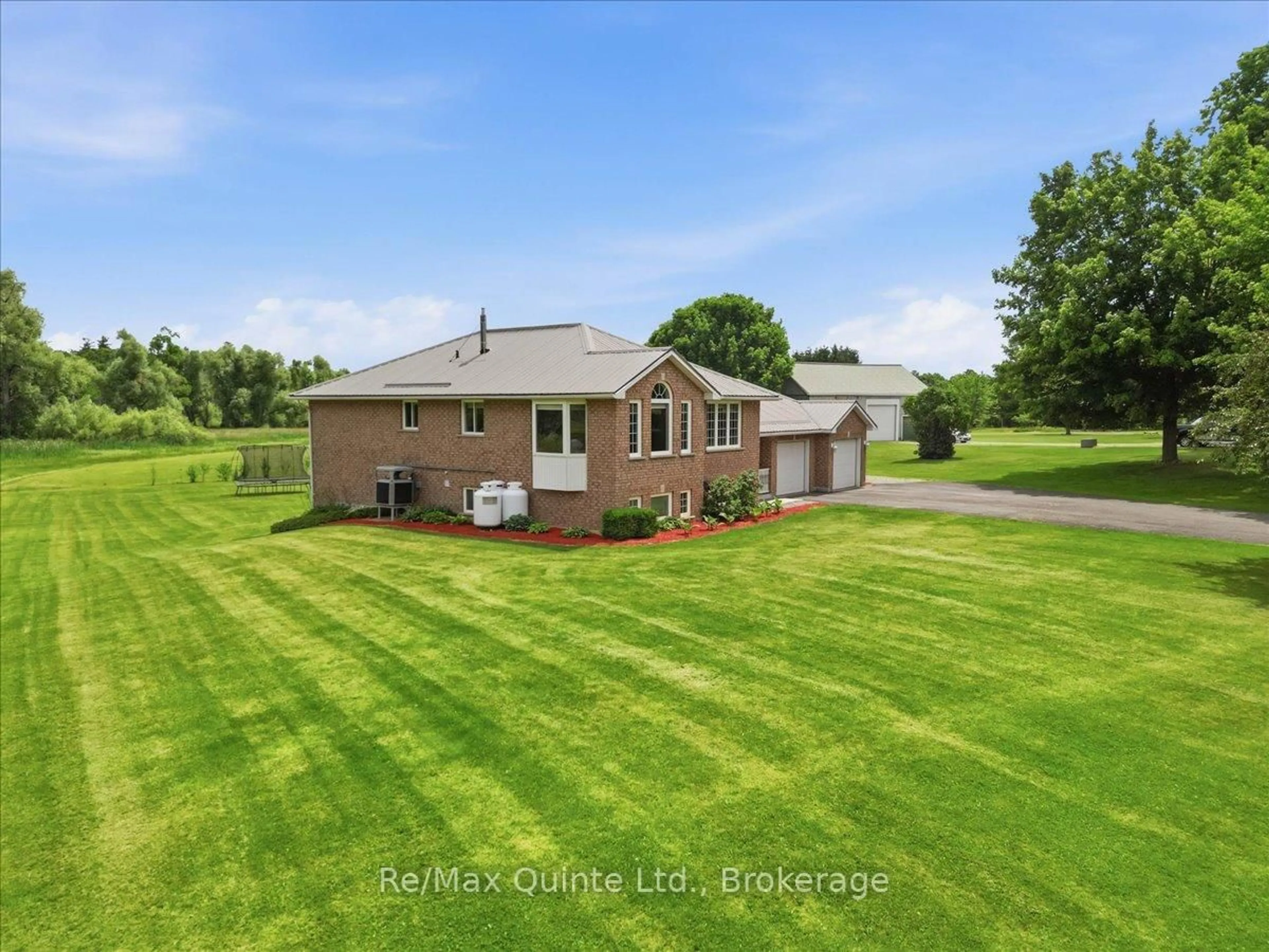 A pic from outside/outdoor area/front of a property/back of a property/a pic from drone, water/lake/river/ocean view for 219 Helyer Rd, Ingleside Ontario K8V 5P4