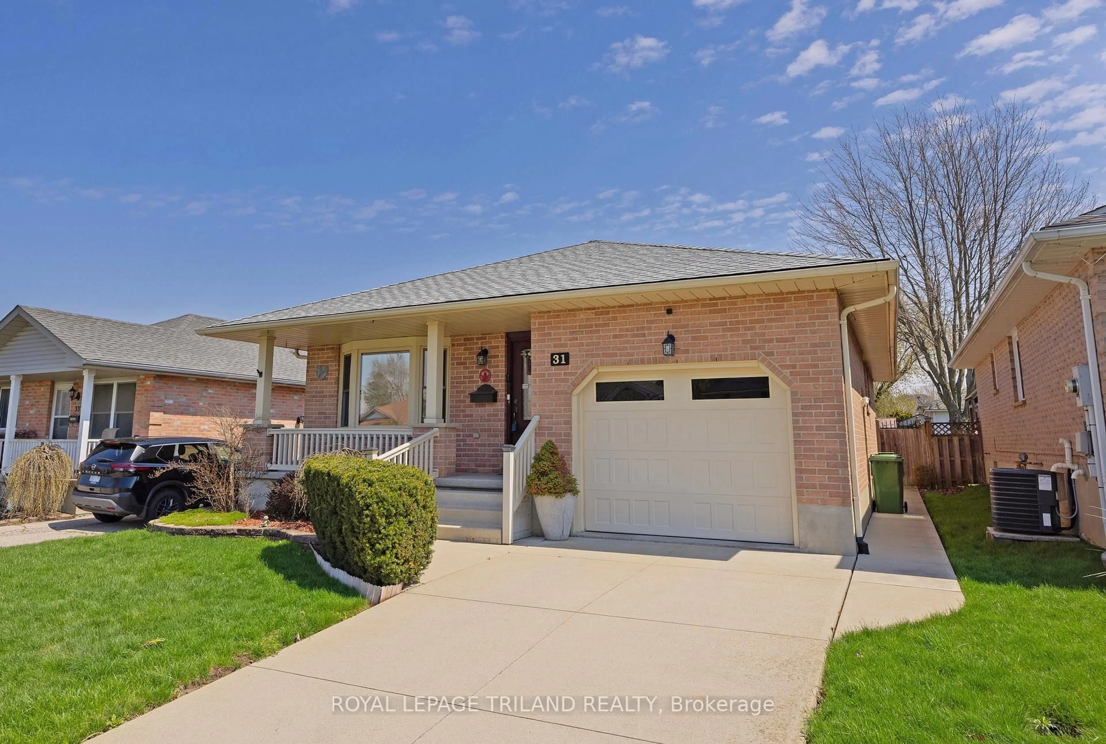 Home with brick exterior material, street for 31 Neal Ave, St. Thomas Ontario N5R 6B5