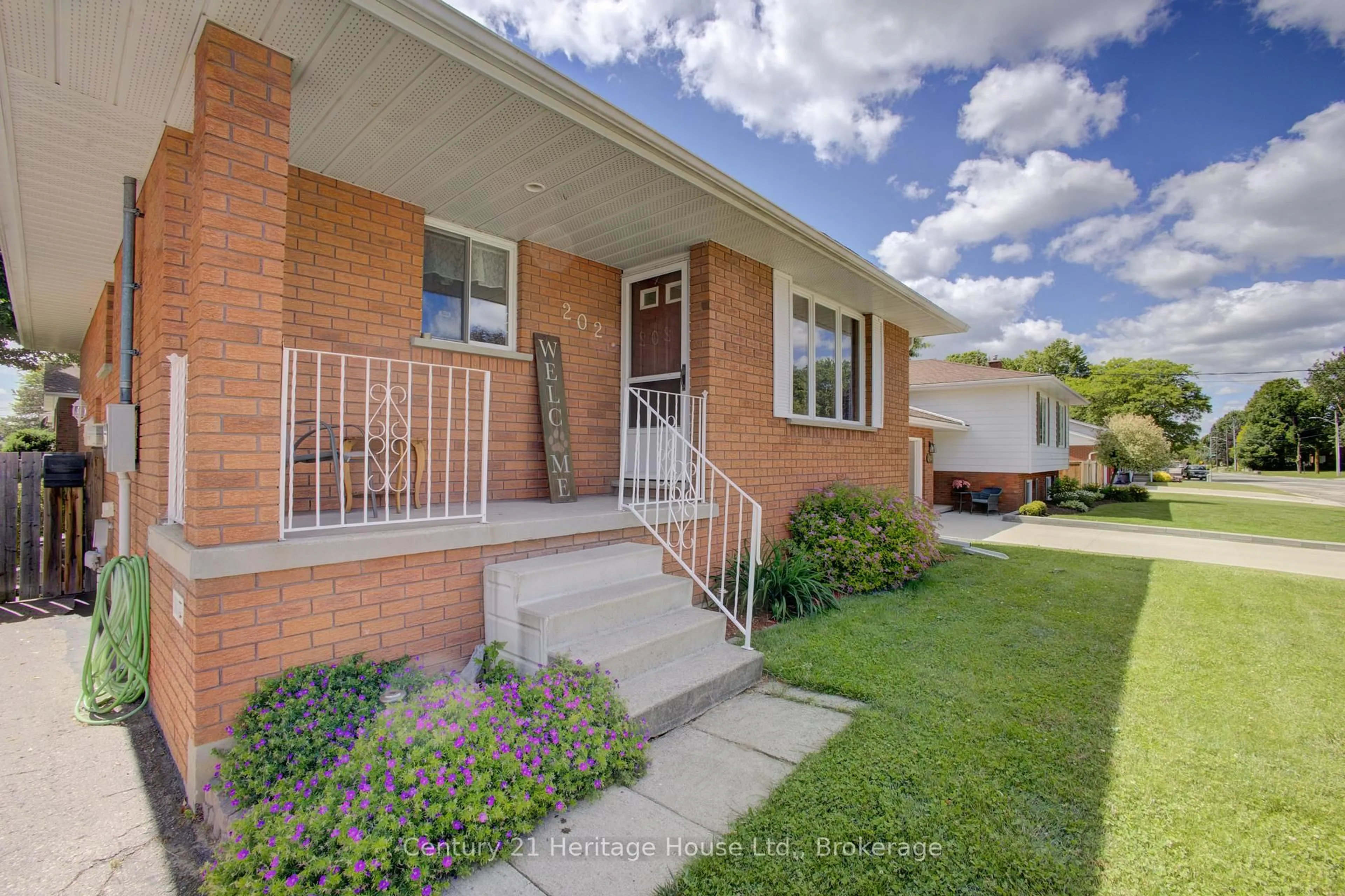 Home with brick exterior material, street for 202 15th Ave, Hanover Ontario N4N 3L4
