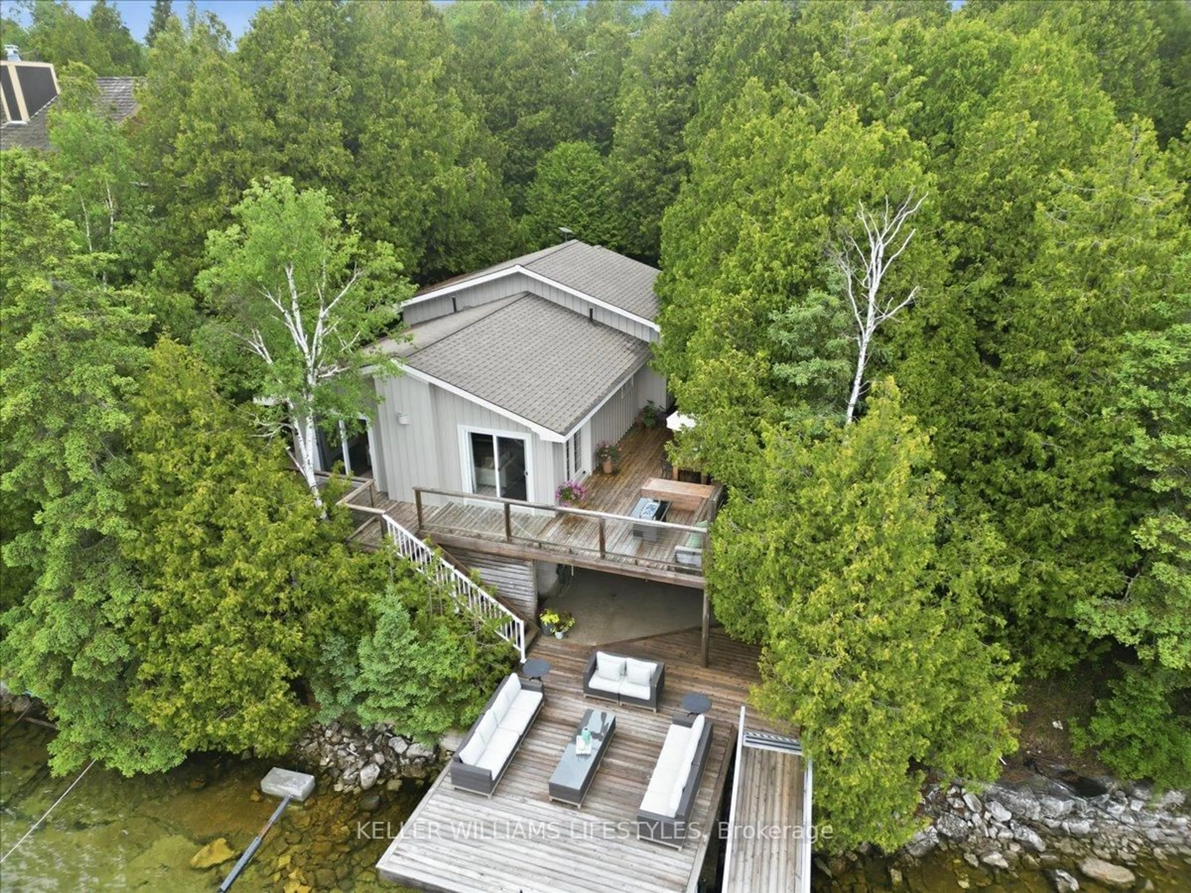A pic from outside/outdoor area/front of a property/back of a property/a pic from drone, water/lake/river/ocean view for 204 Big Tub Rd, Northern Bruce Peninsula Ontario N0H 2R0