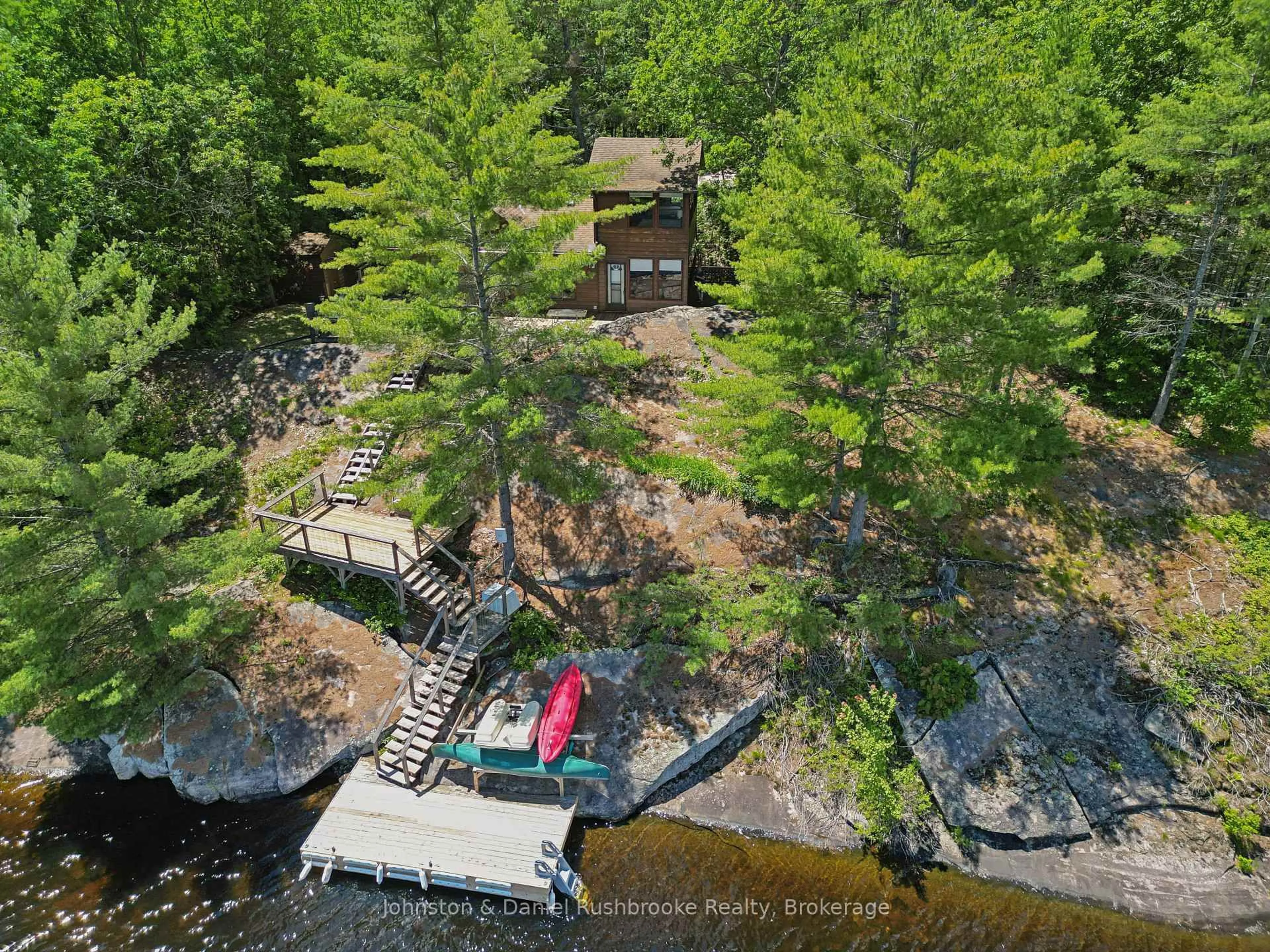 A pic from outside/outdoor area/front of a property/back of a property/a pic from drone, water/lake/river/ocean view for 1277 & 1279 Woodland Dr, Gravenhurst Ontario P1P 1R2