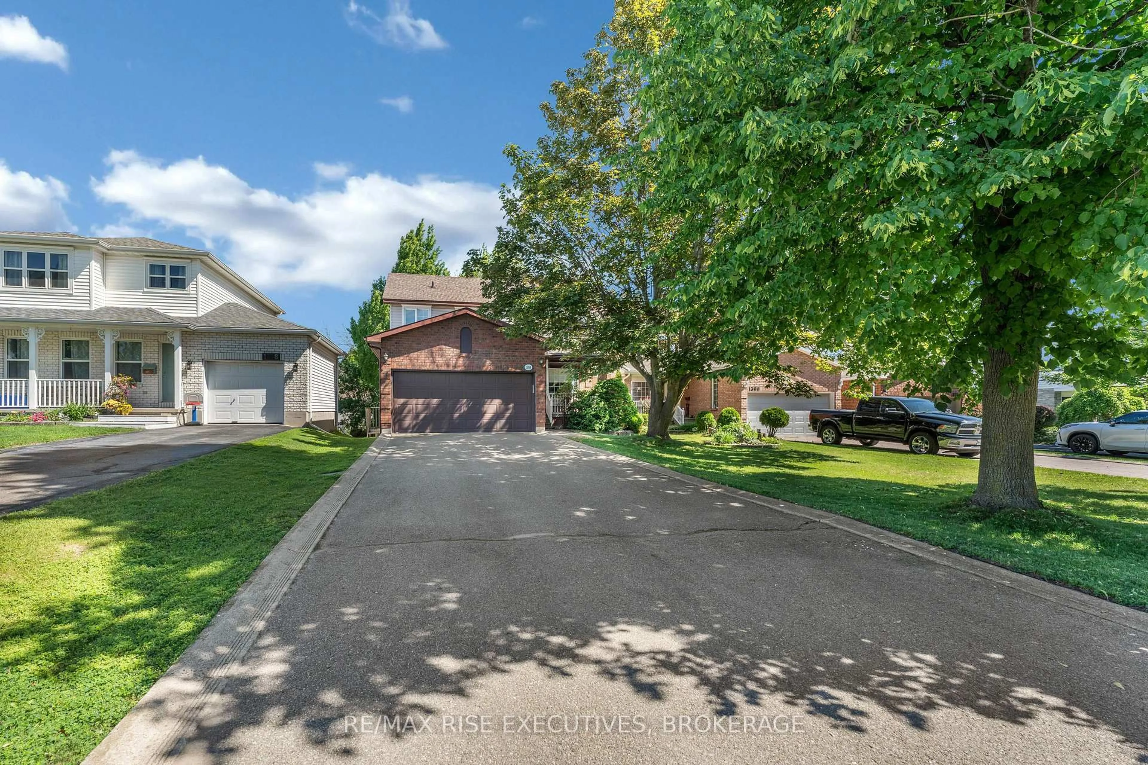 A pic from outside/outdoor area/front of a property/back of a property/a pic from drone, street for 1304 Fisher Cres, Kingston Ontario K7M 8T2