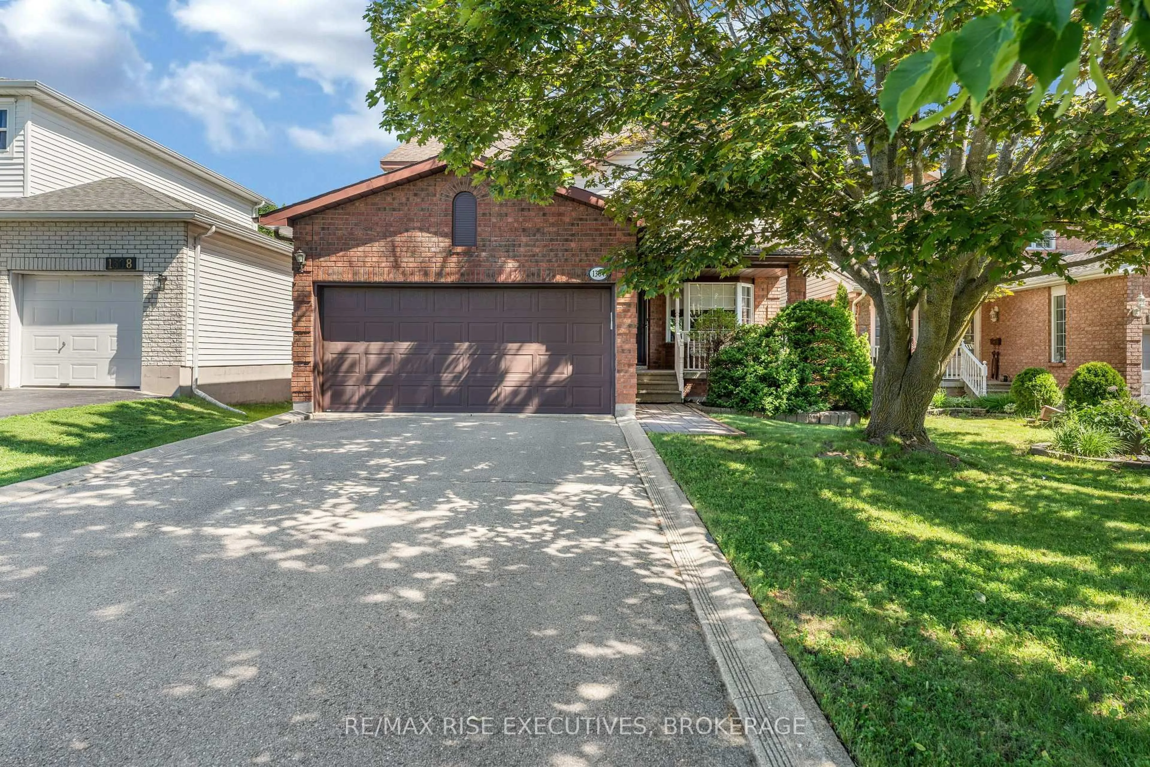 A pic from outside/outdoor area/front of a property/back of a property/a pic from drone, street for 1304 Fisher Cres, Kingston Ontario K7M 8T2