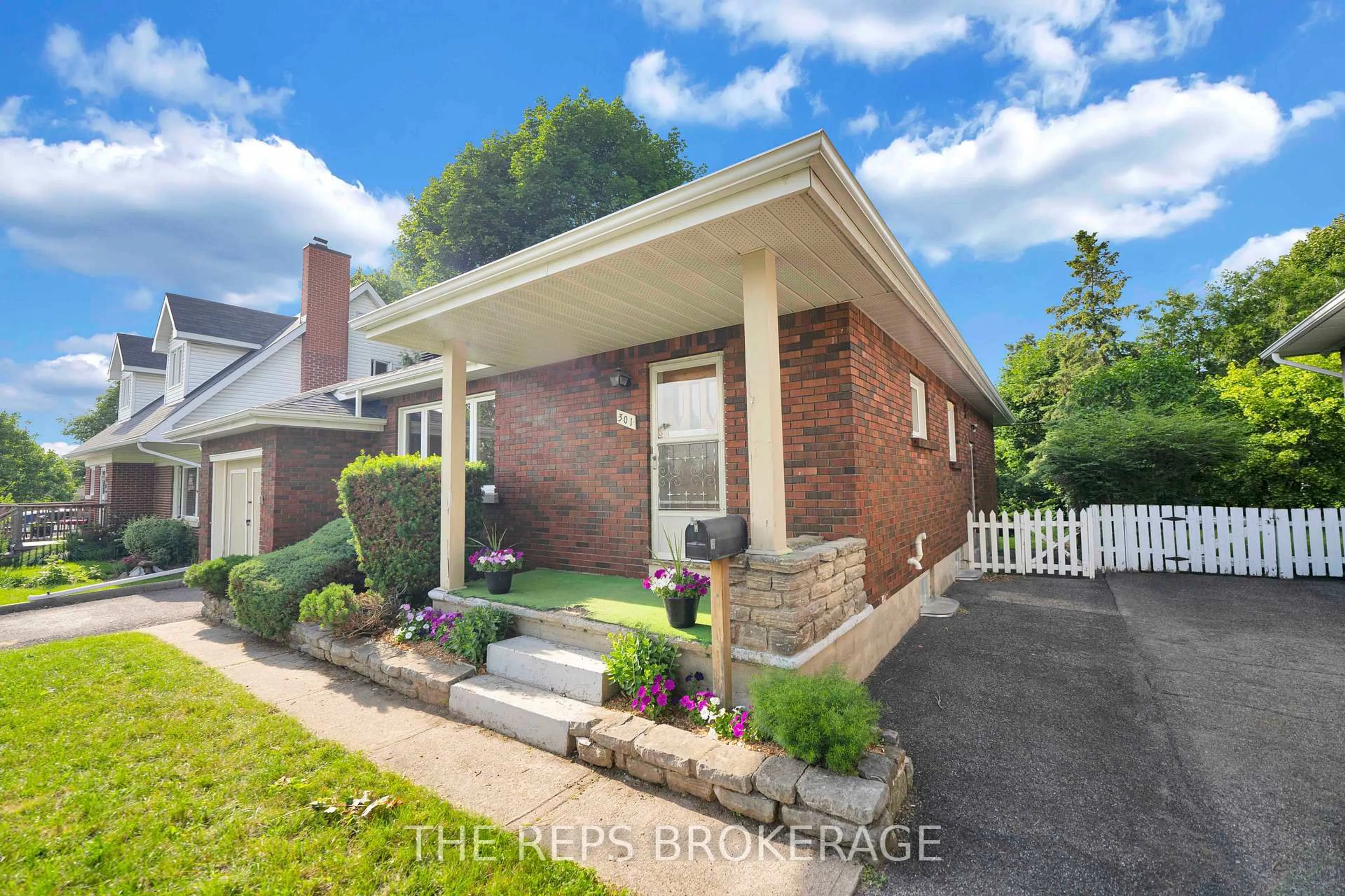Home with brick exterior material, street for 301 Knox Cres, Ottawa Ontario K1G 0K9