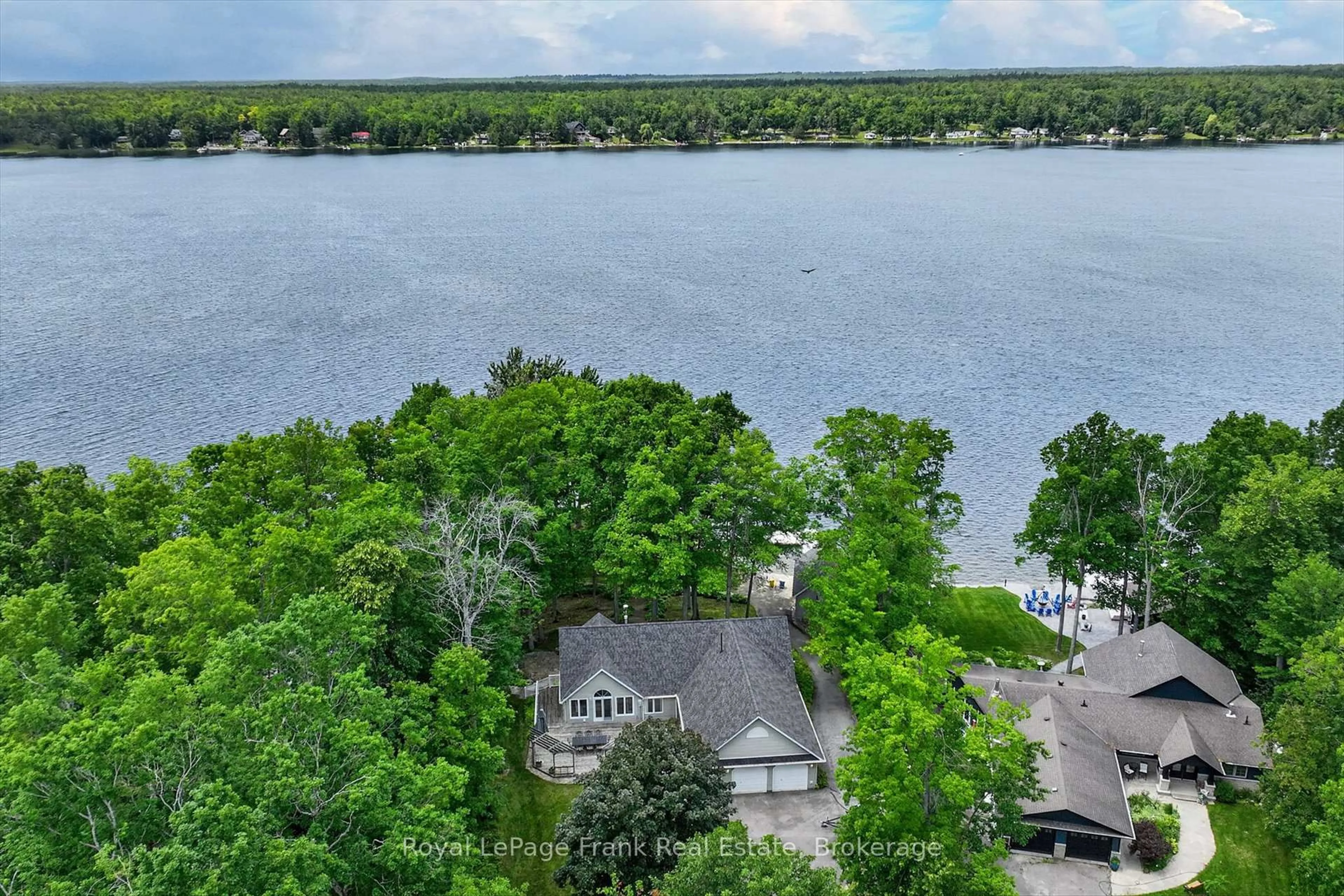 A pic from outside/outdoor area/front of a property/back of a property/a pic from drone, water/lake/river/ocean view for 2864 Antelope Tr, Selwyn Ontario K0L 2H0