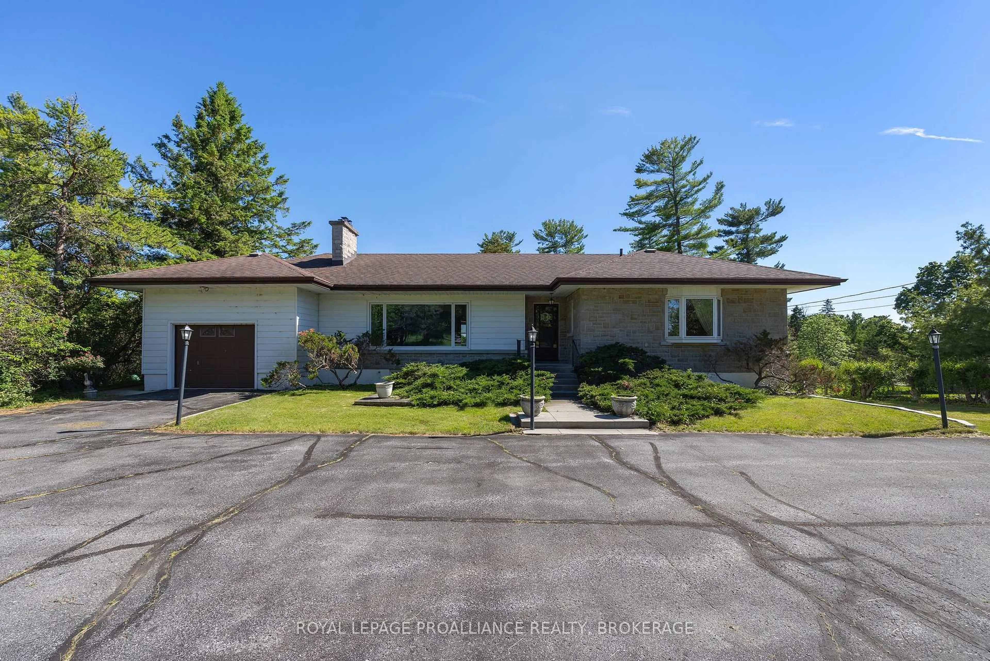 A pic from outside/outdoor area/front of a property/back of a property/a pic from drone, street for 4756 Bath Rd, Bath Ontario K0H 1G0