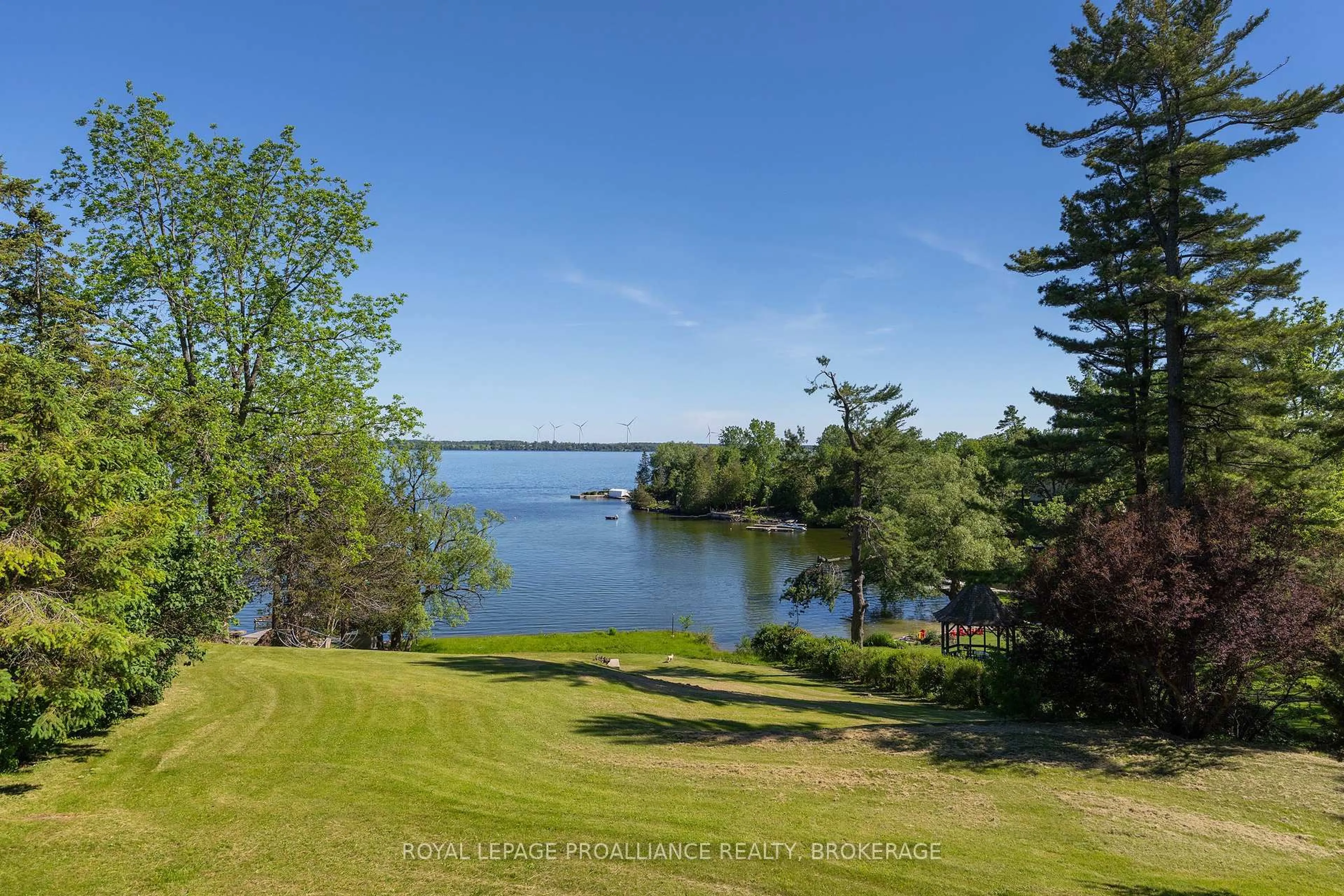 A pic from outside/outdoor area/front of a property/back of a property/a pic from drone, water/lake/river/ocean view for 4756 Bath Rd, Bath Ontario K0H 1G0