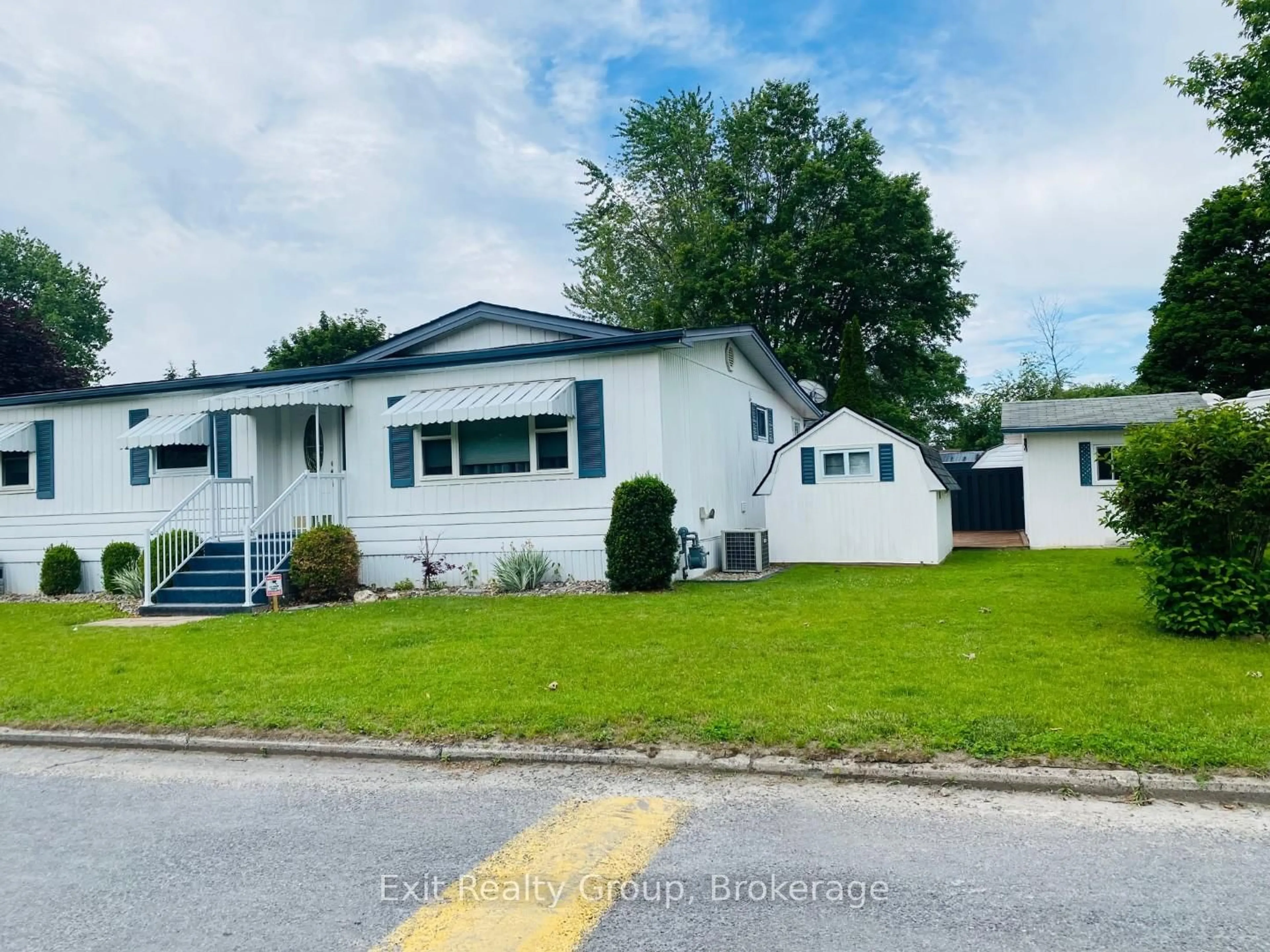 Home with vinyl exterior material, street for 4 Oriole Lane, Quinte West Ontario K8N 4Z3