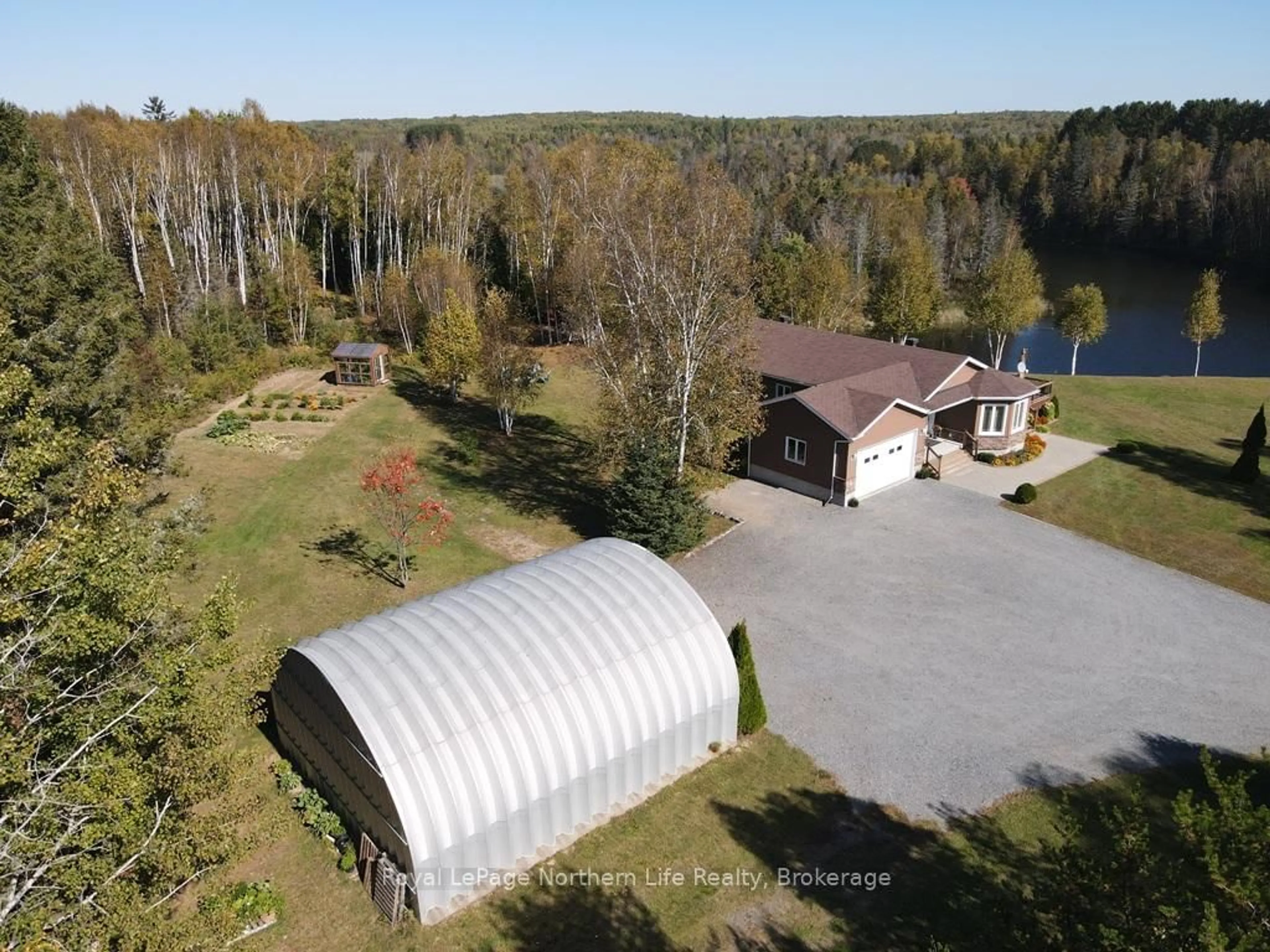 A pic from outside/outdoor area/front of a property/back of a property/a pic from drone, water/lake/river/ocean view for 1725 Highway 575, West Nipissing Ontario P0H 1M0