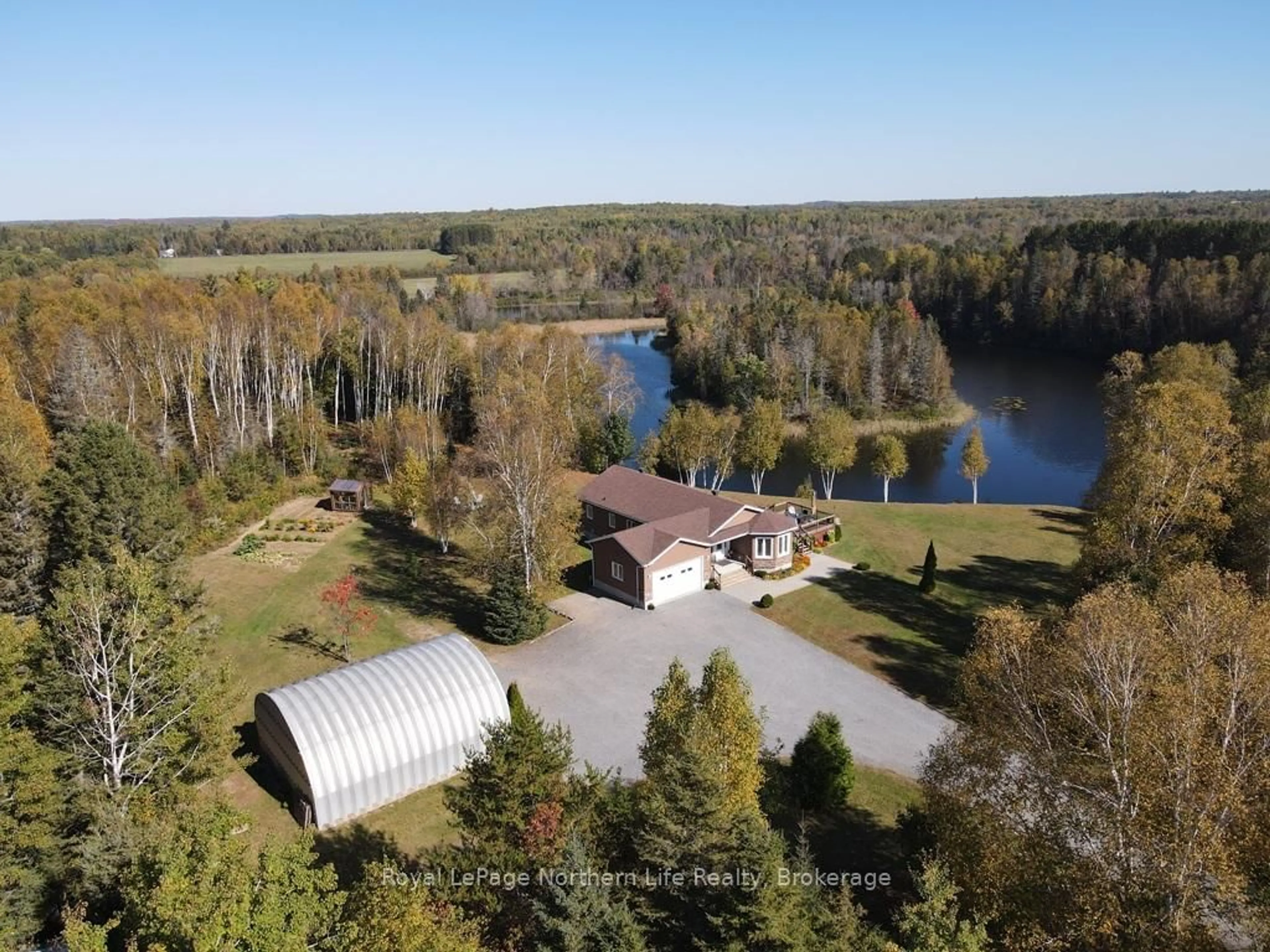 A pic from outside/outdoor area/front of a property/back of a property/a pic from drone, water/lake/river/ocean view for 1725 Highway 575, West Nipissing Ontario P0H 1M0