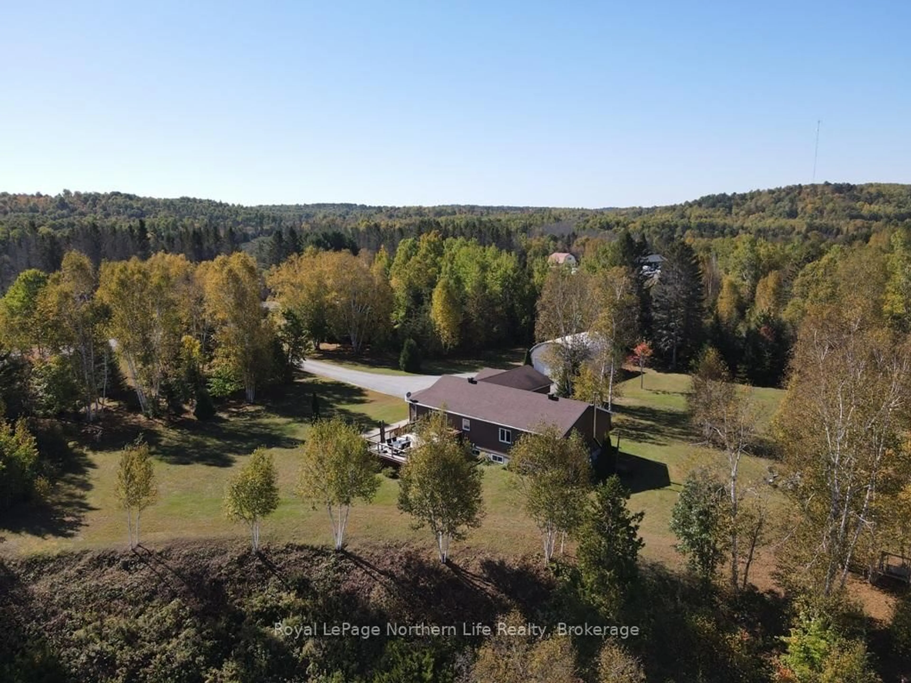 A pic from outside/outdoor area/front of a property/back of a property/a pic from drone, forest/trees view for 1725 Highway 575, West Nipissing Ontario P0H 1M0