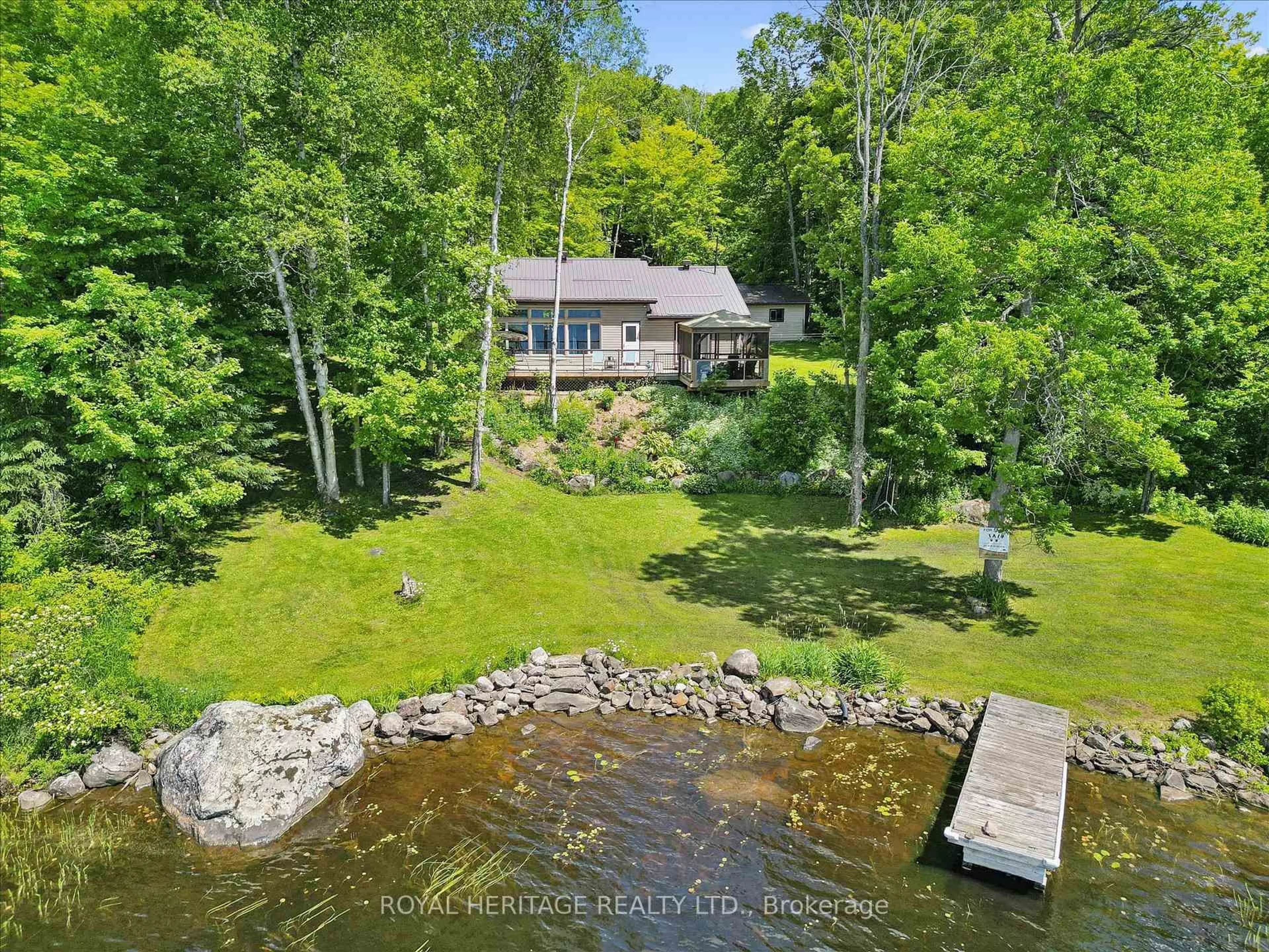 A pic from outside/outdoor area/front of a property/back of a property/a pic from drone, water/lake/river/ocean view for 614 Sieber Rd, Ryerson Ontario P0A 1C0