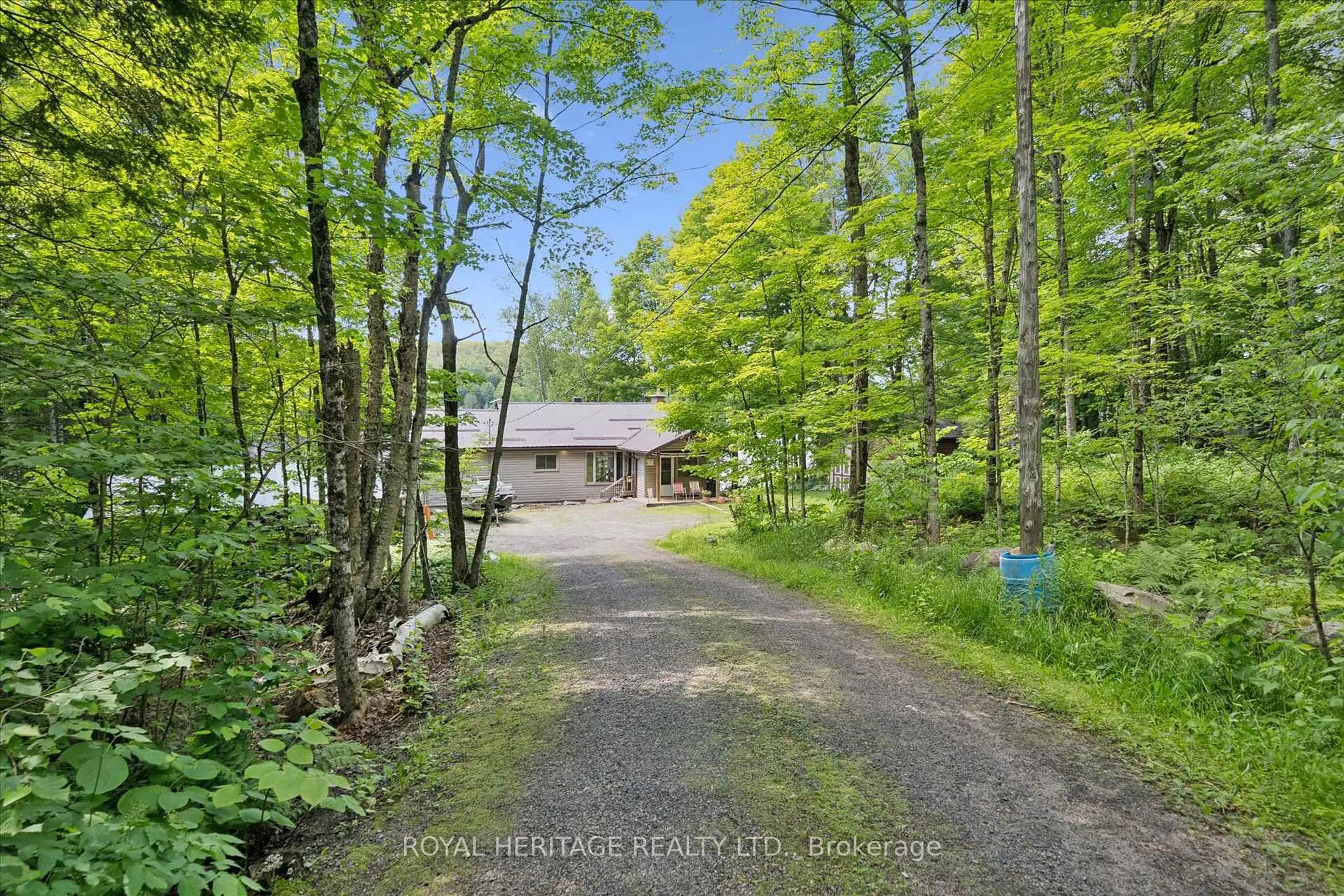 A pic from outside/outdoor area/front of a property/back of a property/a pic from drone, forest/trees view for 614 Sieber Rd, Ryerson Ontario P0A 1C0