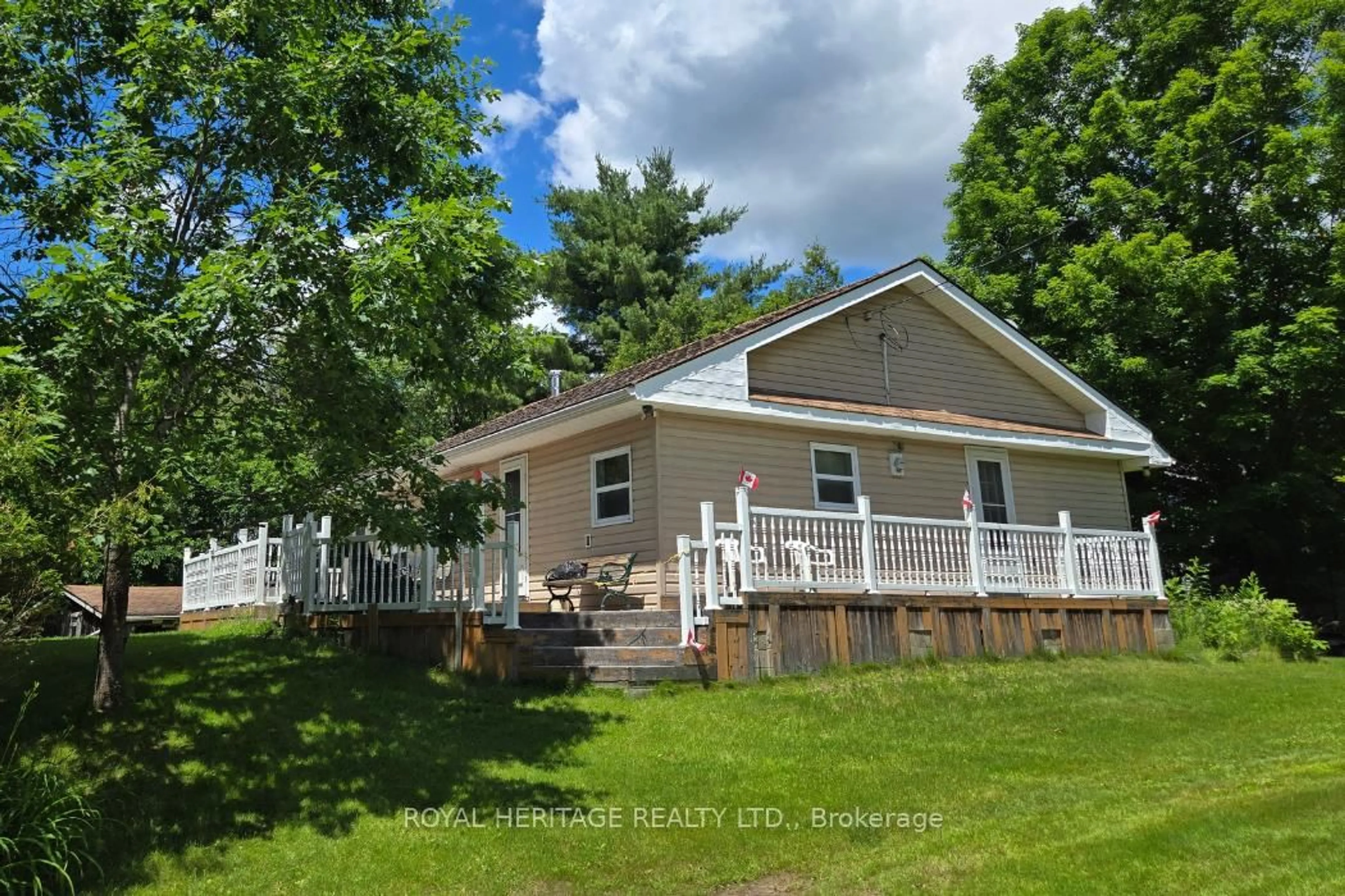 A pic from outside/outdoor area/front of a property/back of a property/a pic from drone, unknown for 1021 Spruce Tr #15, Arden Ontario K0H 1B0
