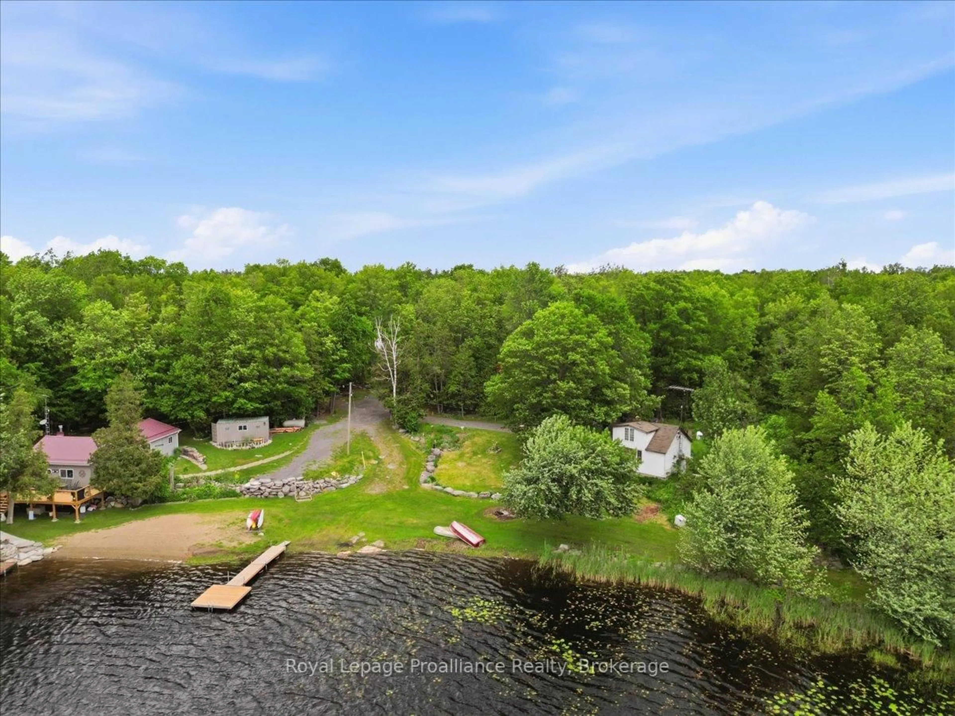 A pic from outside/outdoor area/front of a property/back of a property/a pic from drone, water/lake/river/ocean view for 12 Cosgrove Lane, Limoges Ontario K0K 2M0