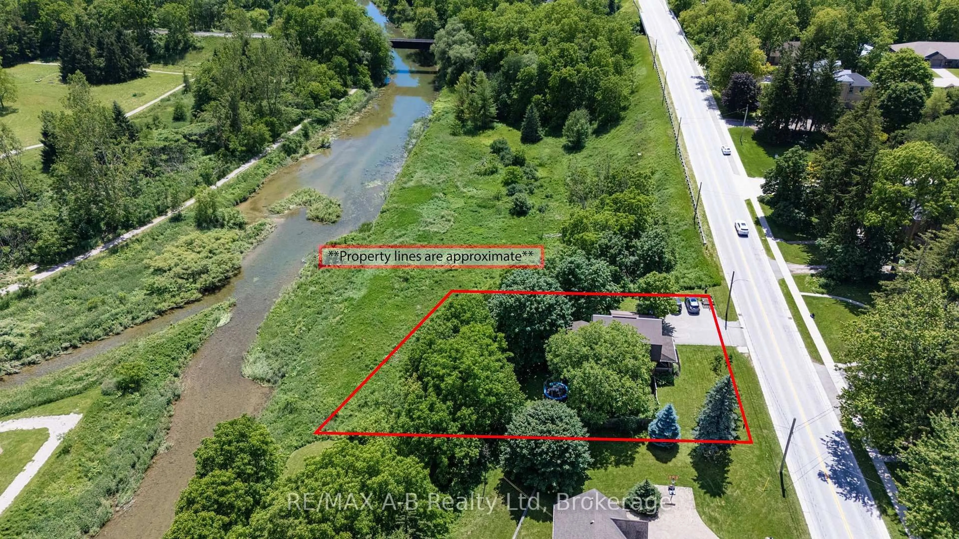 A pic from outside/outdoor area/front of a property/back of a property/a pic from drone, water/lake/river/ocean view for 77 Blanshard St, West Perth Ontario N0K 1N0