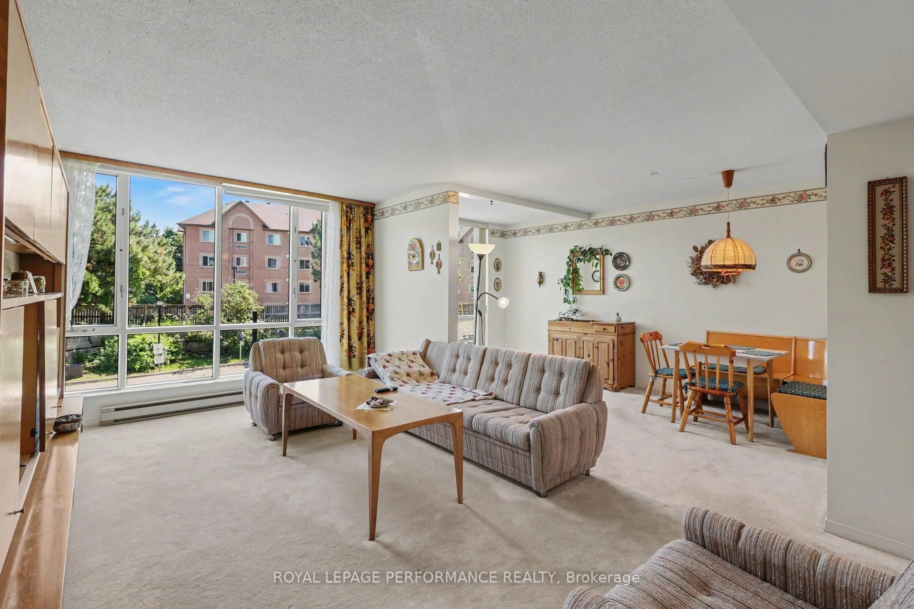 Living room with furniture, unknown for 340 Centrum Blvd #304, Ottawa Ontario K1E 3W1