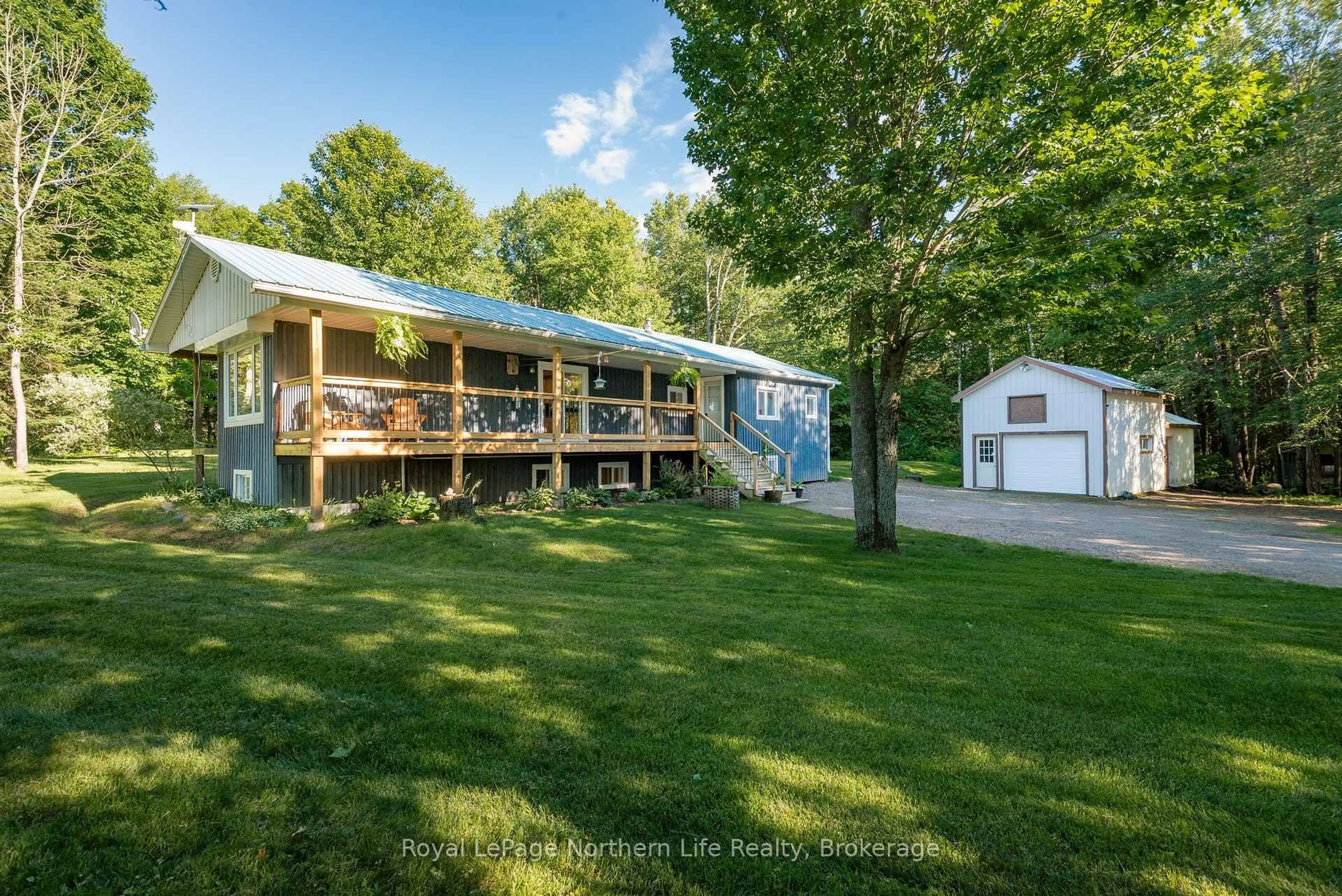 A pic from outside/outdoor area/front of a property/back of a property/a pic from drone, water/lake/river/ocean view for 1601 Memorial Park Dr, Chisholm Ontario P0H 1Z0