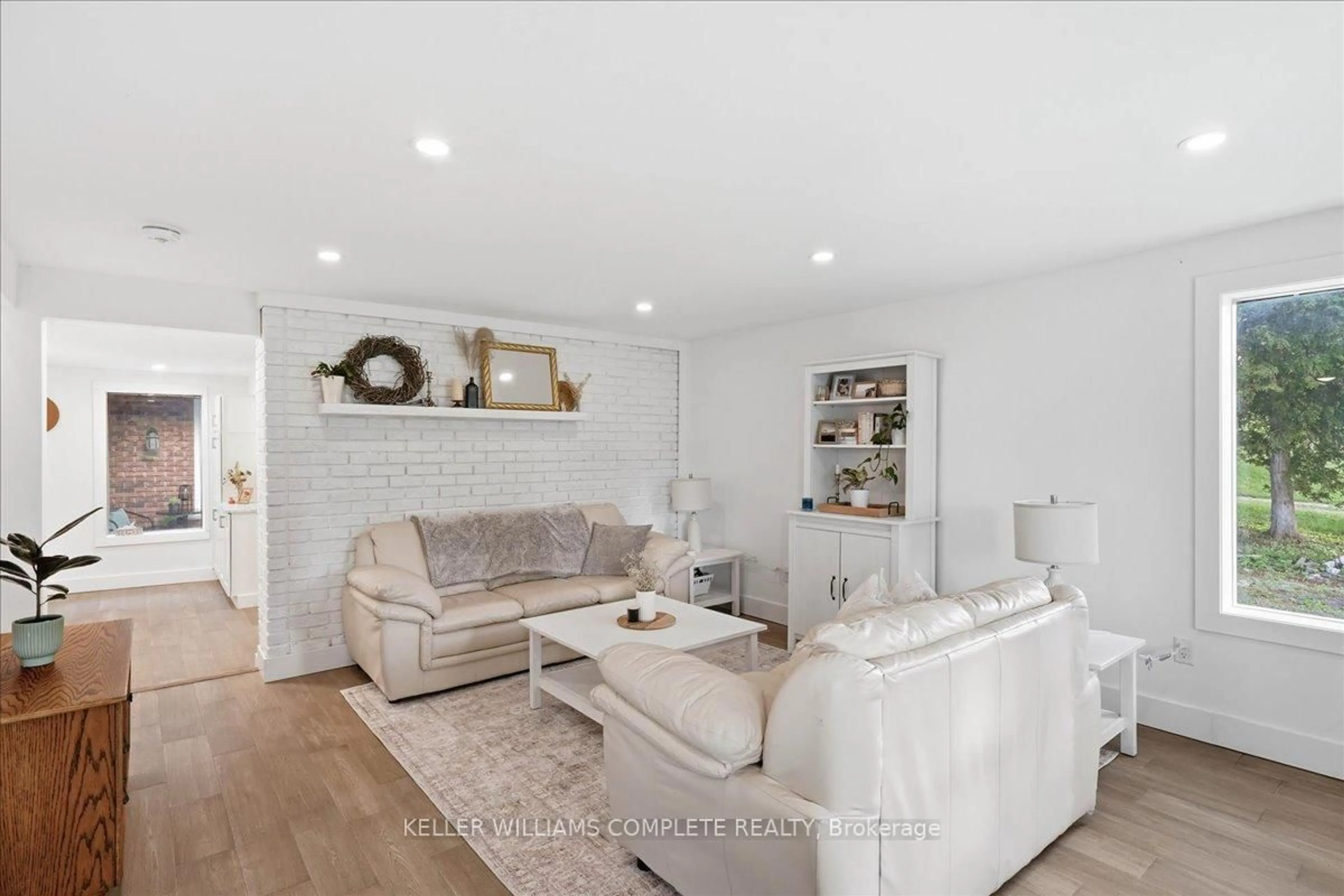 Living room with furniture, wood/laminate floor for 46 OLD PORTAGE Rd, Quinte West Ontario K0K 1L0