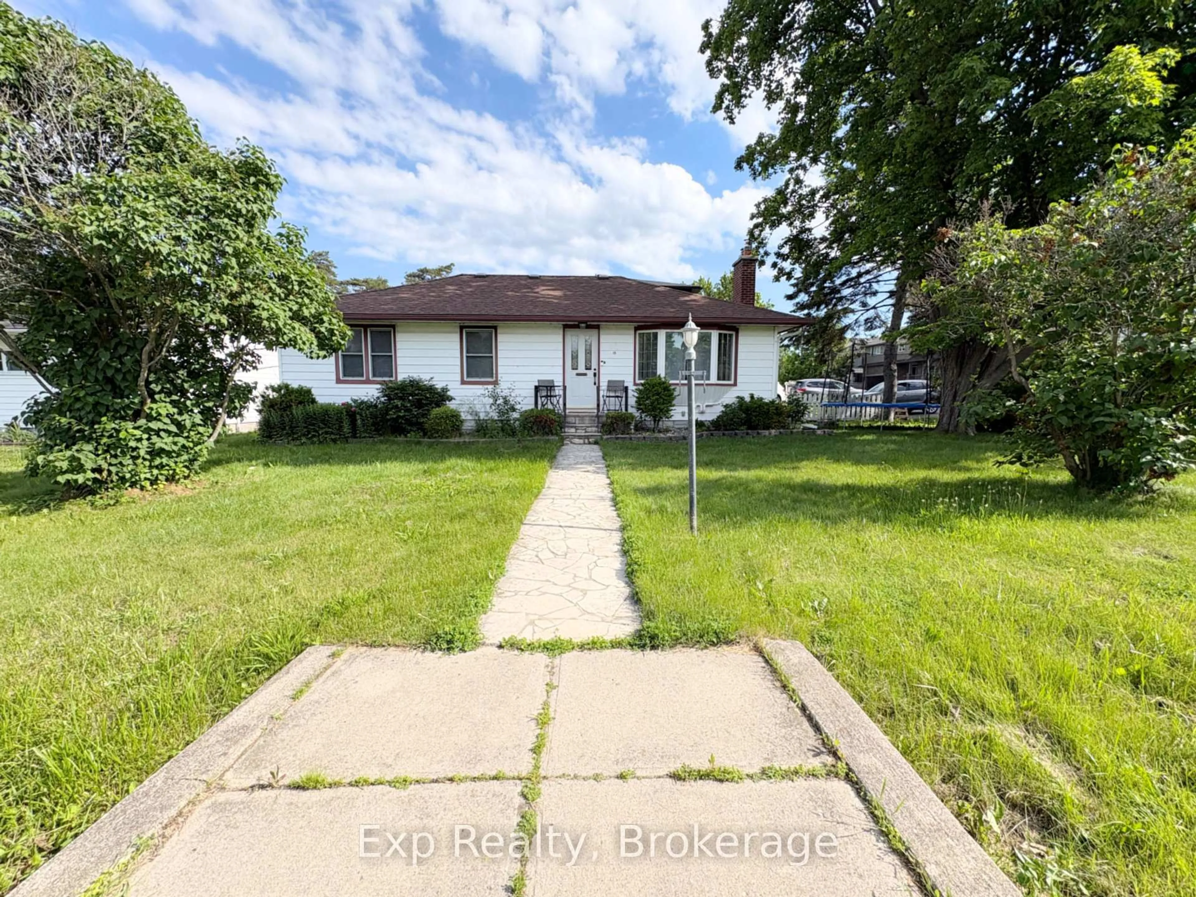 A pic from outside/outdoor area/front of a property/back of a property/a pic from drone, street for 15 Redden St, Kingston Ontario K7M 4K9