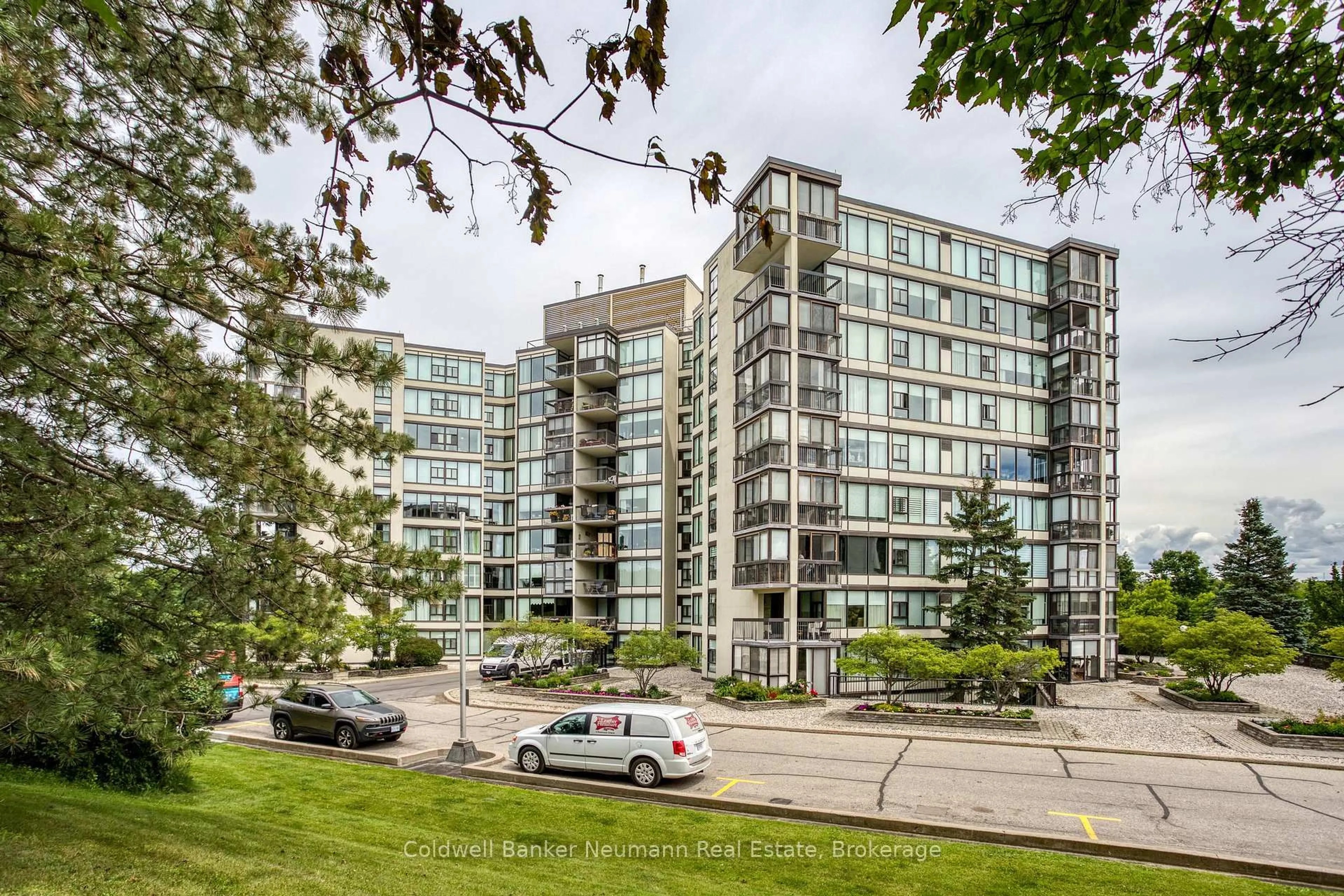 A pic from outside/outdoor area/front of a property/back of a property/a pic from drone, building for 23 Woodlawn Rd #205, Guelph Ontario N1H 7G6