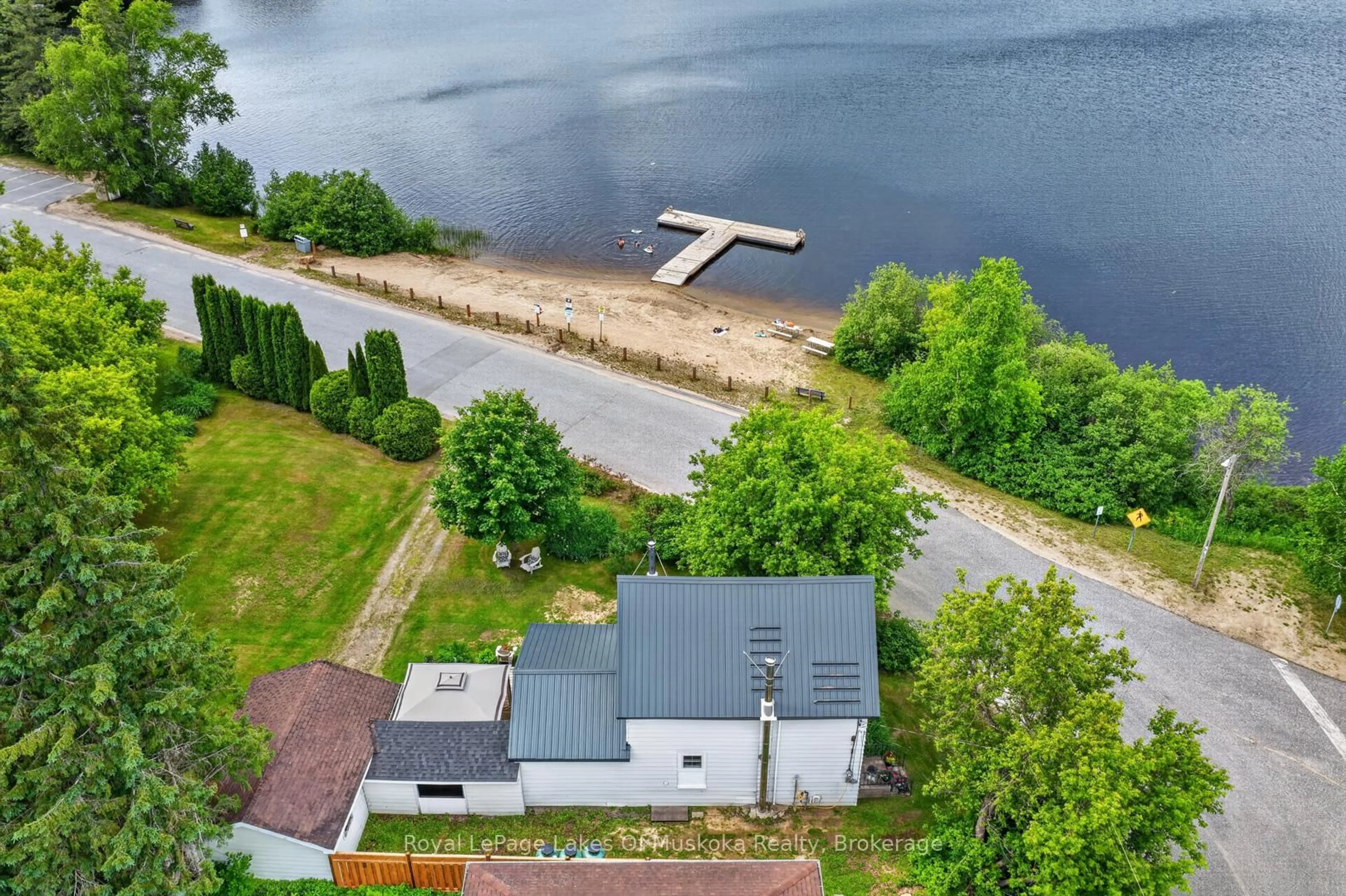 A pic from outside/outdoor area/front of a property/back of a property/a pic from drone, water/lake/river/ocean view for 21 Lakeview Ave, Kearney Ontario P0A 1M0