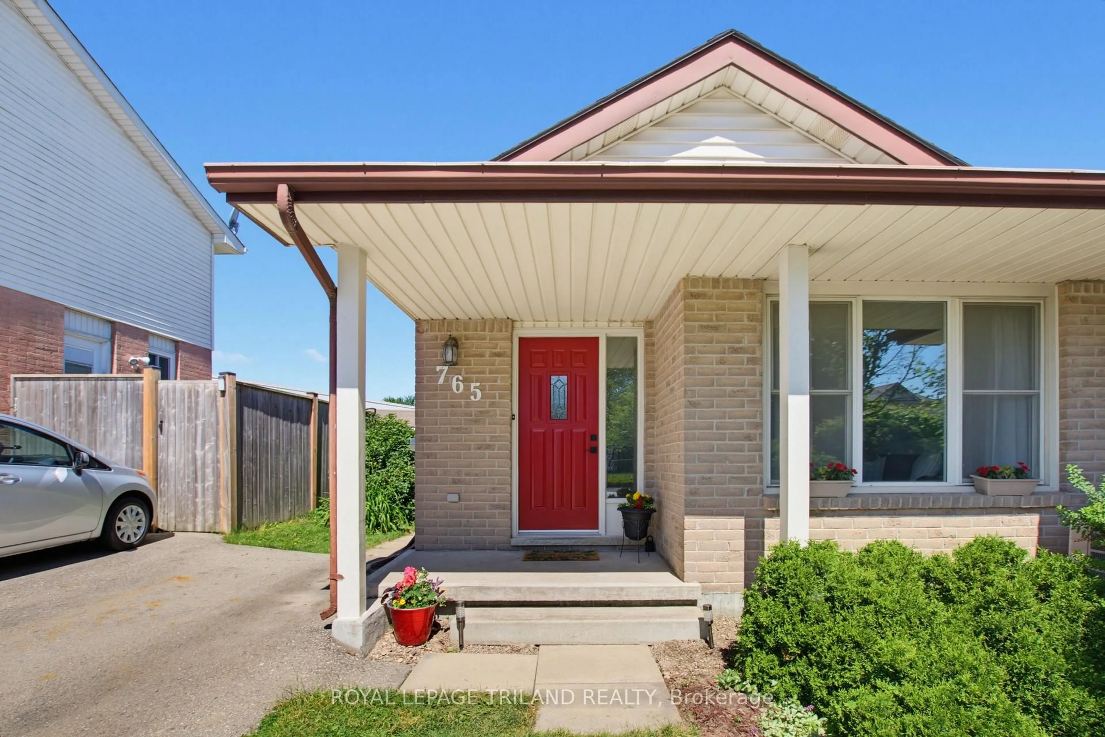 Home with brick exterior material, street for 765 Homeview Rd, London South Ontario N6C 5N7