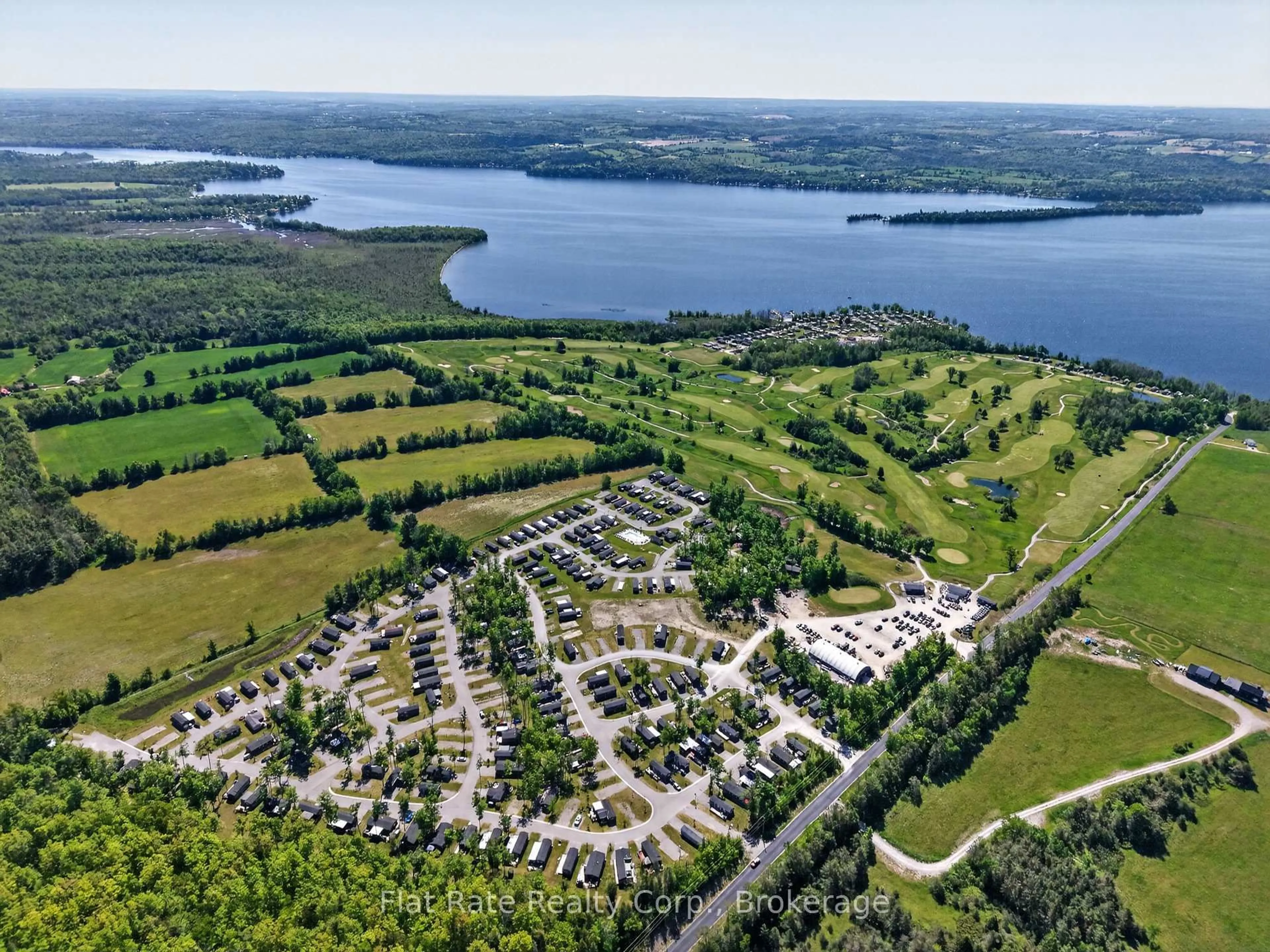 A pic from outside/outdoor area/front of a property/back of a property/a pic from drone, water/lake/river/ocean view for 1235 Villiers Line #ROSEDALE LANE #5, Otonabee-South Monaghan Ontario K0L 2G0