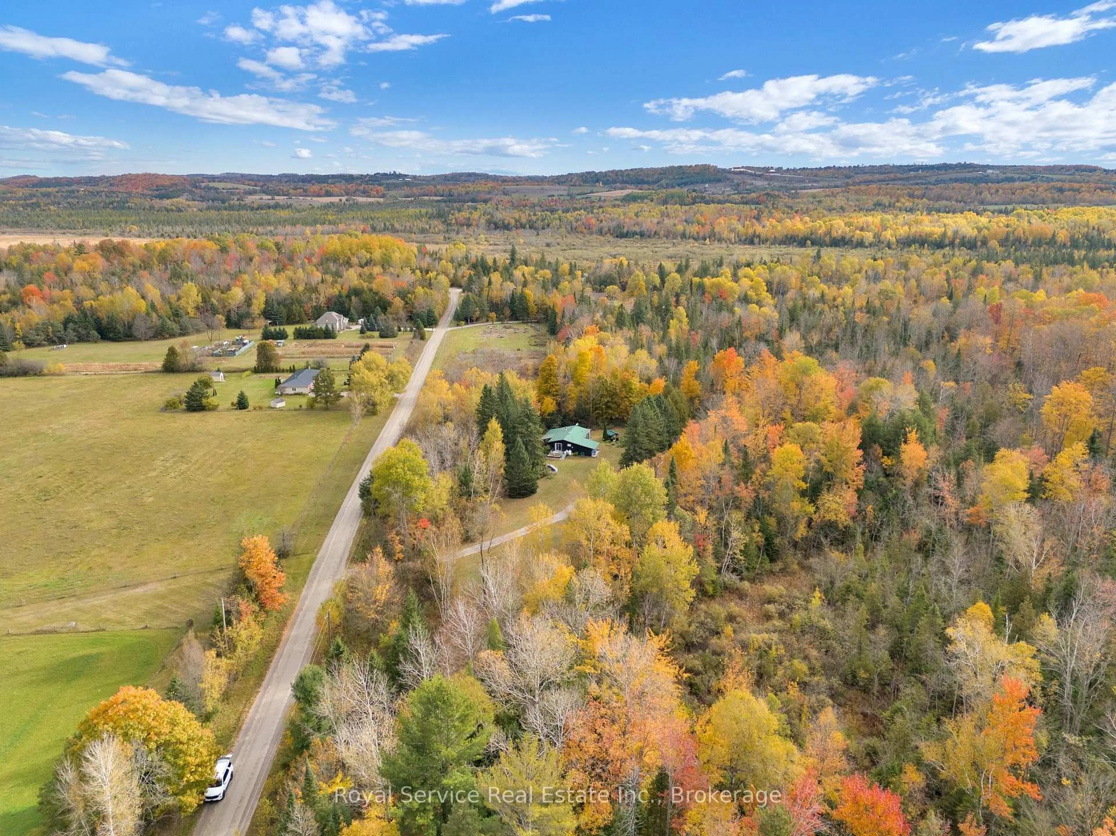 A pic from outside/outdoor area/front of a property/back of a property/a pic from drone, forest/trees view for 1204 Pigeon Creek Rd, Kawartha Lakes Ontario L0B 1K0