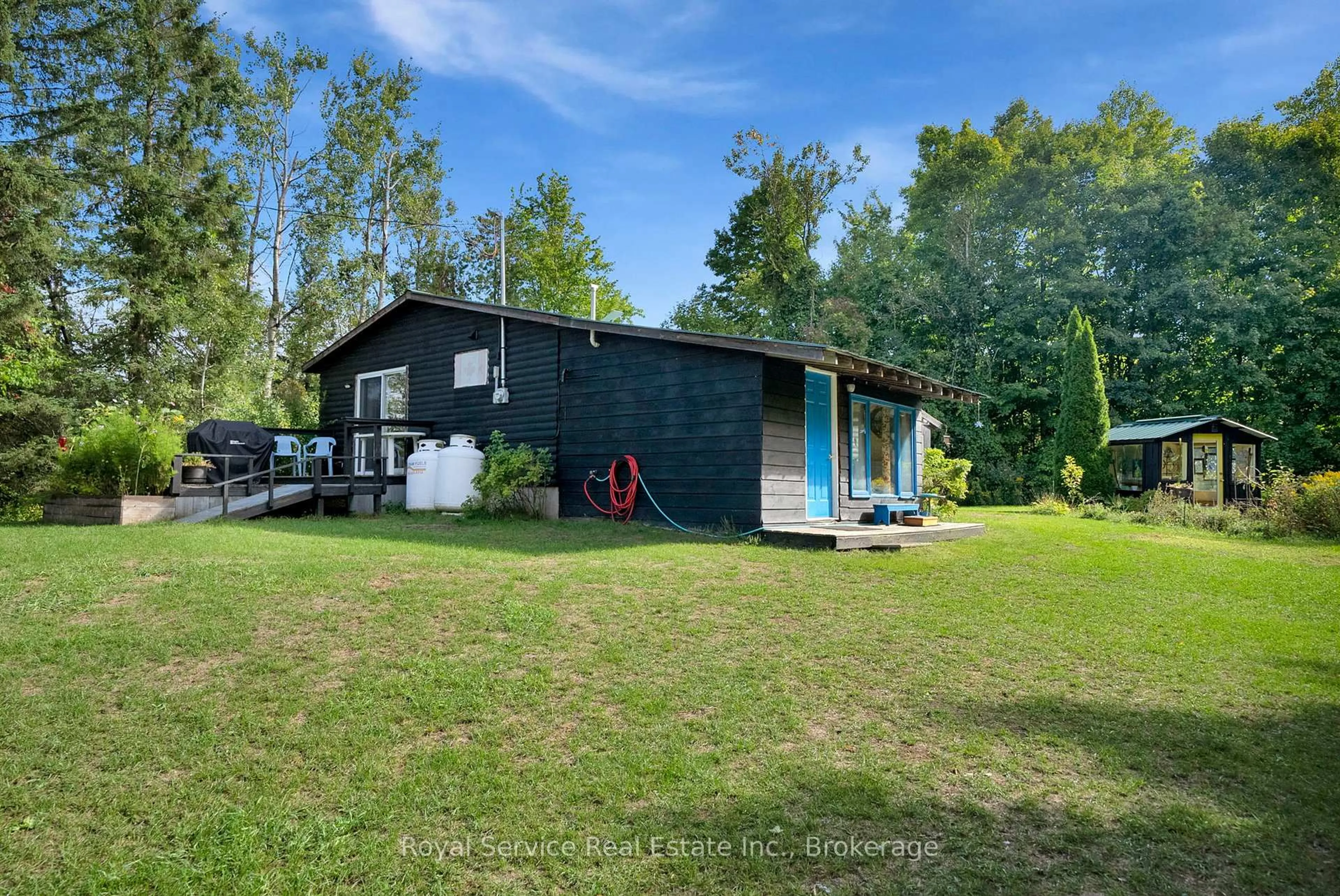 A pic from outside/outdoor area/front of a property/back of a property/a pic from drone, unknown for 1204 Pigeon Creek Rd, Kawartha Lakes Ontario L0B 1K0