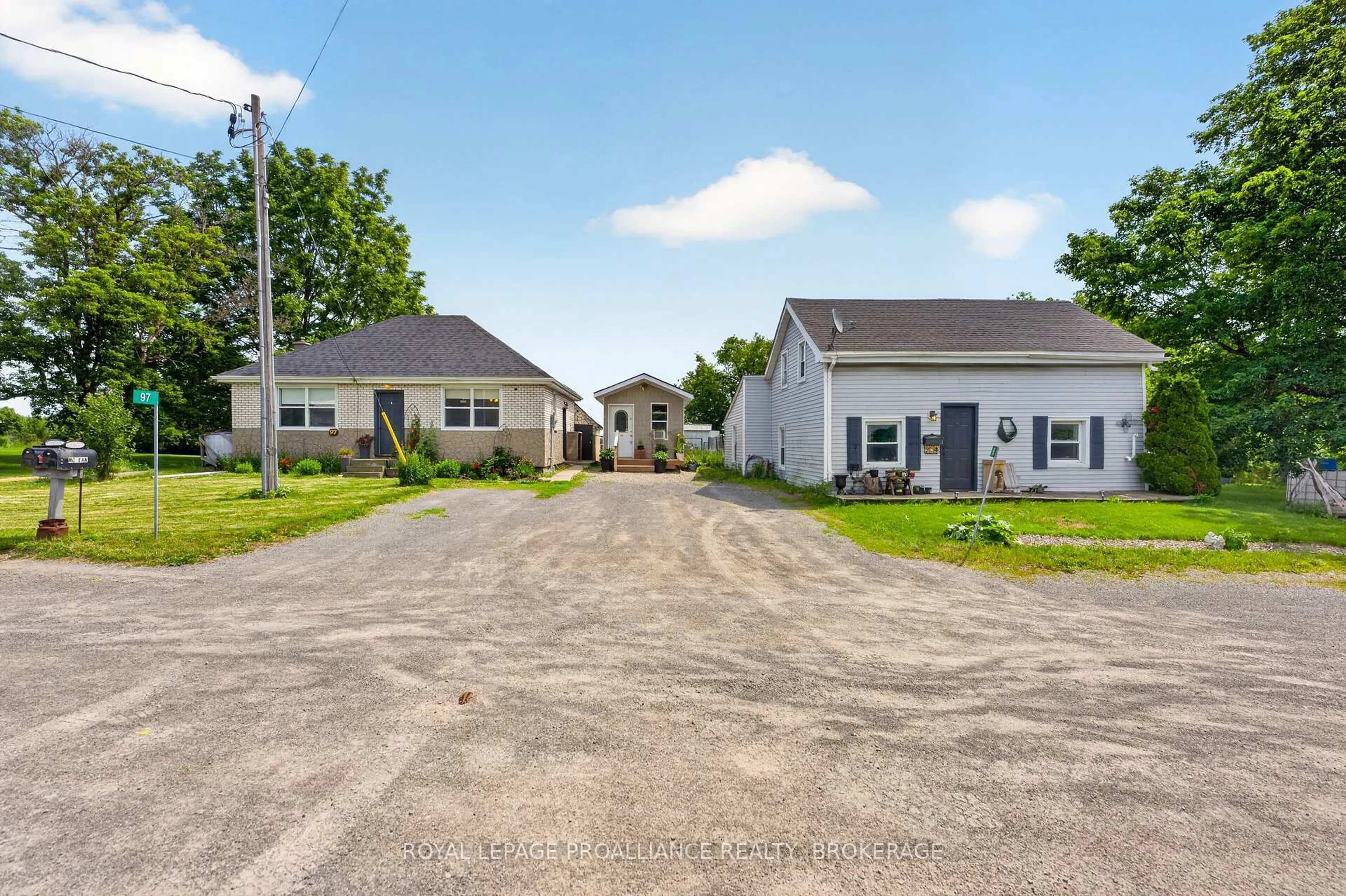 A pic from outside/outdoor area/front of a property/back of a property/a pic from drone, street for 95 & 97 County Road 4, Bath Ontario K0H 1G0