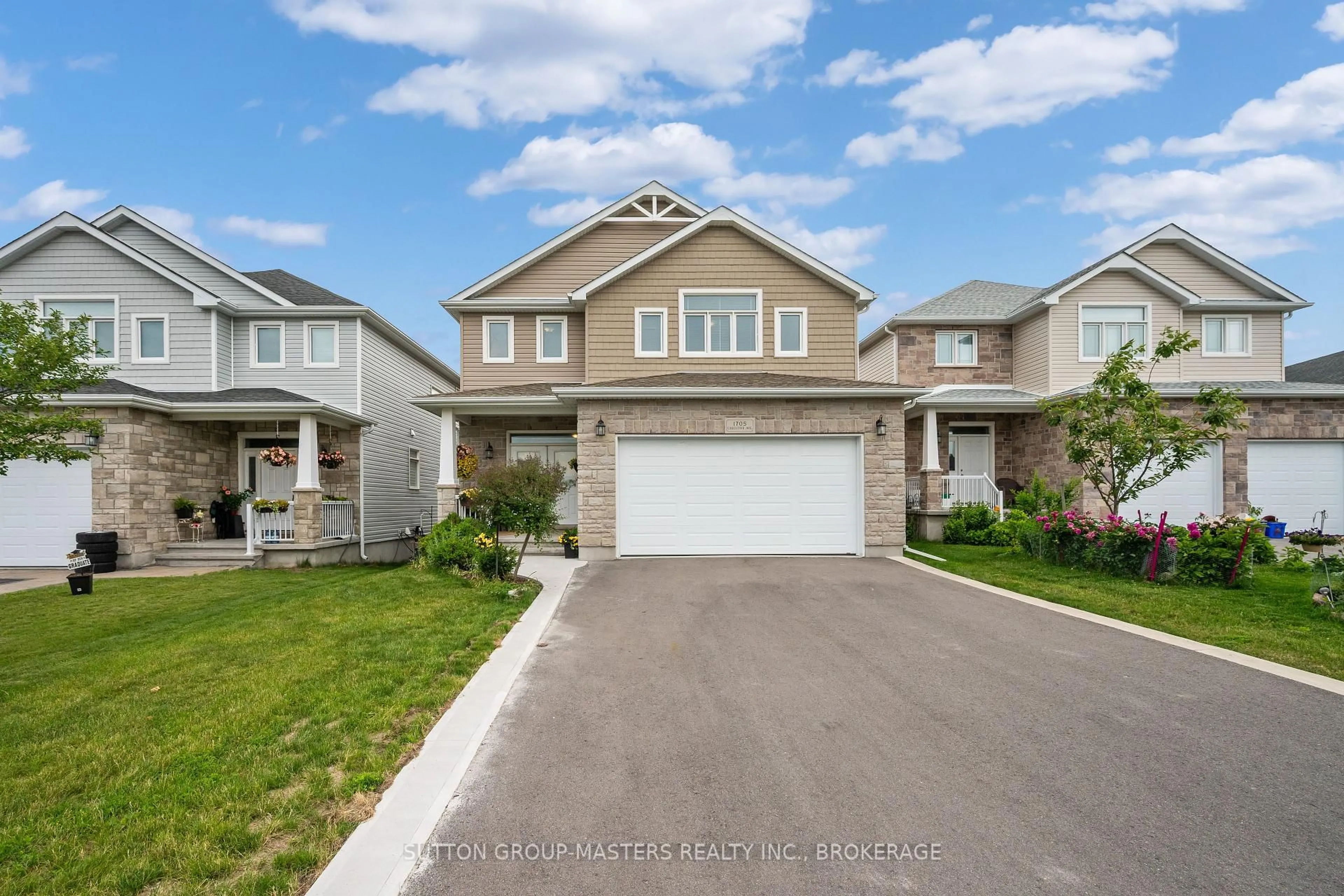 Home with vinyl exterior material, street for 1705 Executive Ave, Kingston Ontario K7P 0L9
