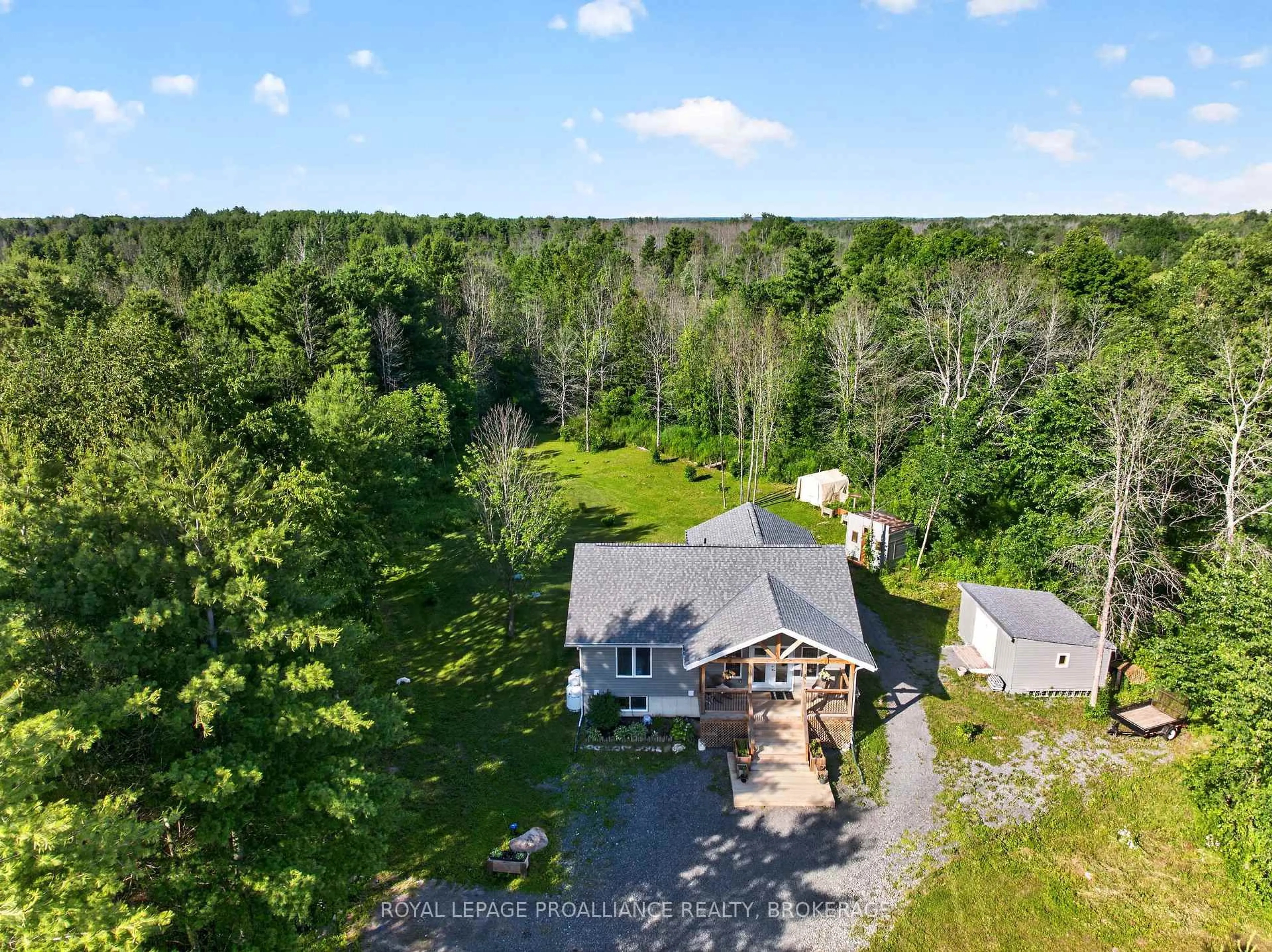 A pic from outside/outdoor area/front of a property/back of a property/a pic from drone, unknown for 499 Bush Rd, Rideau Lakes Ontario K0G 1E0
