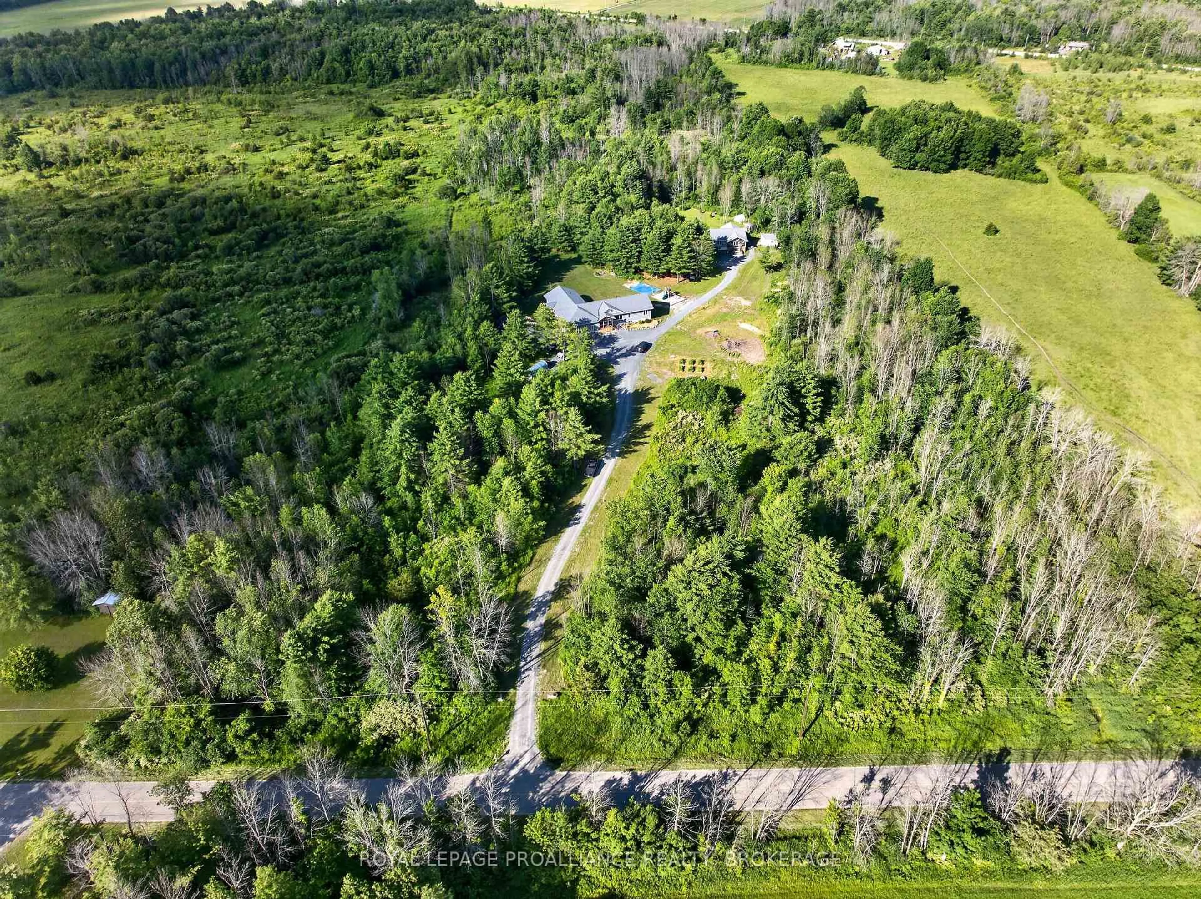 A pic from outside/outdoor area/front of a property/back of a property/a pic from drone, forest/trees view for 499 Bush Rd, Rideau Lakes Ontario K0G 1E0