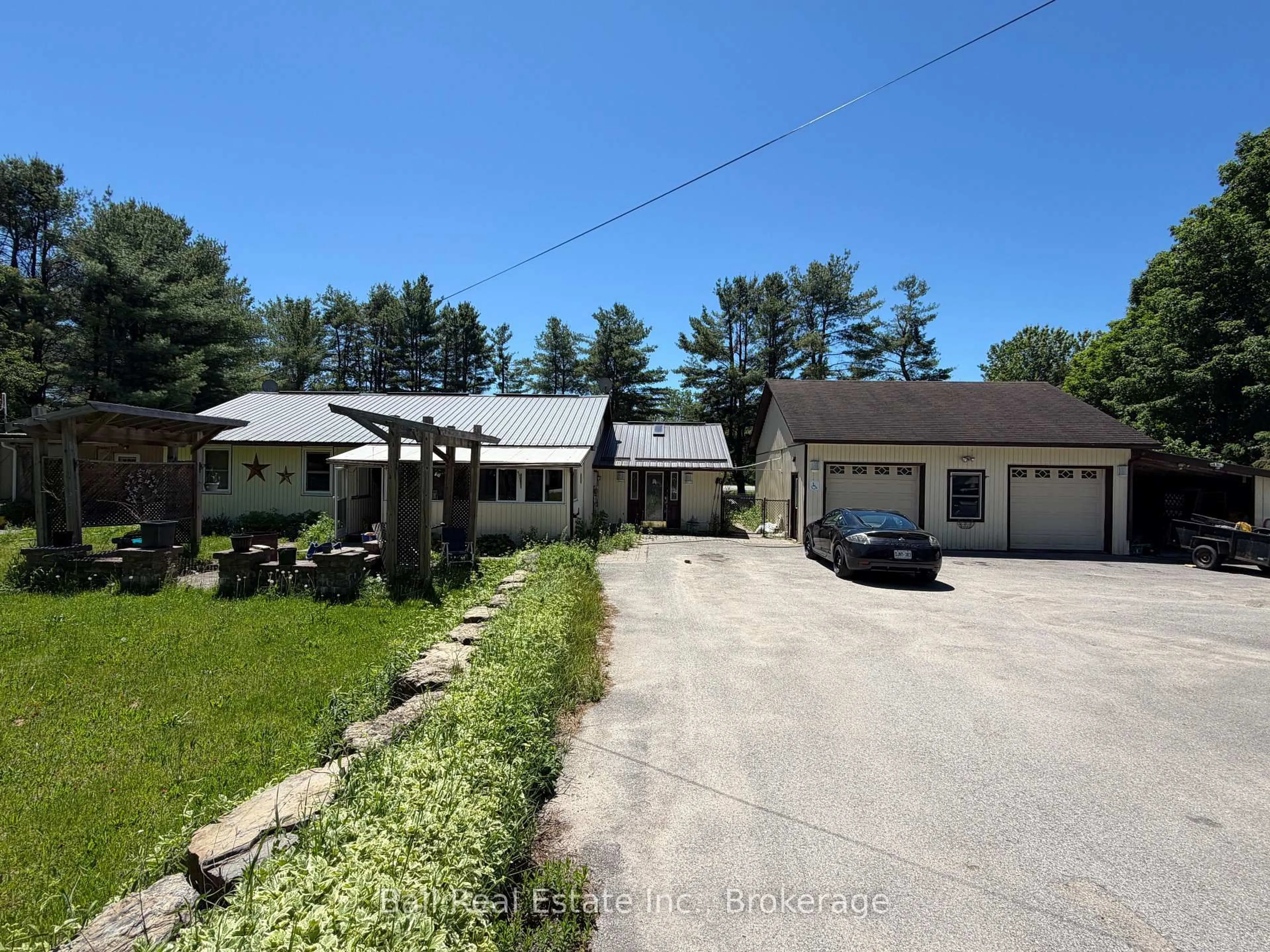 A pic from outside/outdoor area/front of a property/back of a property/a pic from drone, street for 51 Cameron Rd, Kawartha Lakes Ontario K0M 2L0