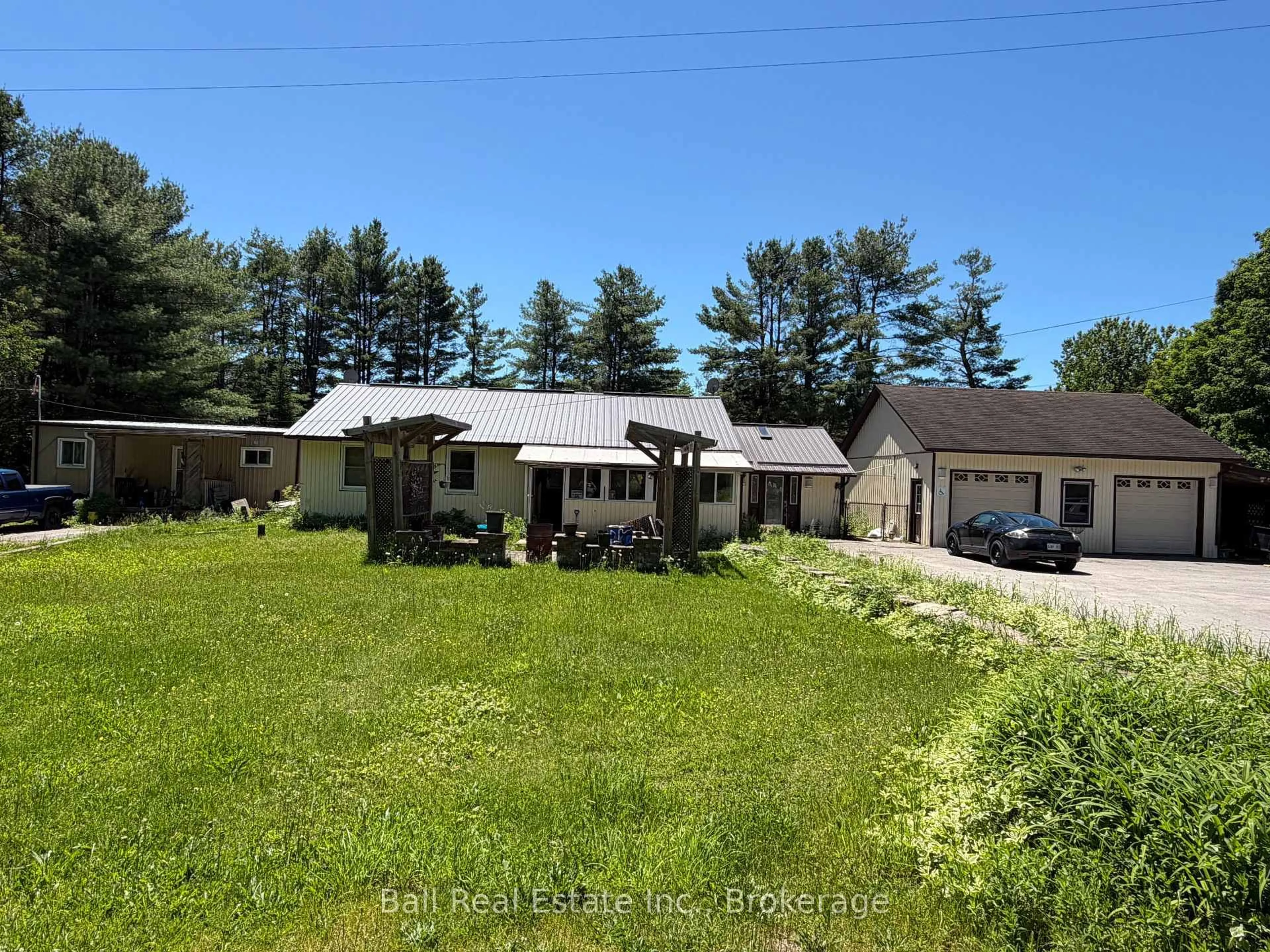 A pic from outside/outdoor area/front of a property/back of a property/a pic from drone, unknown for 51 Cameron Rd, Kawartha Lakes Ontario K0M 2L0