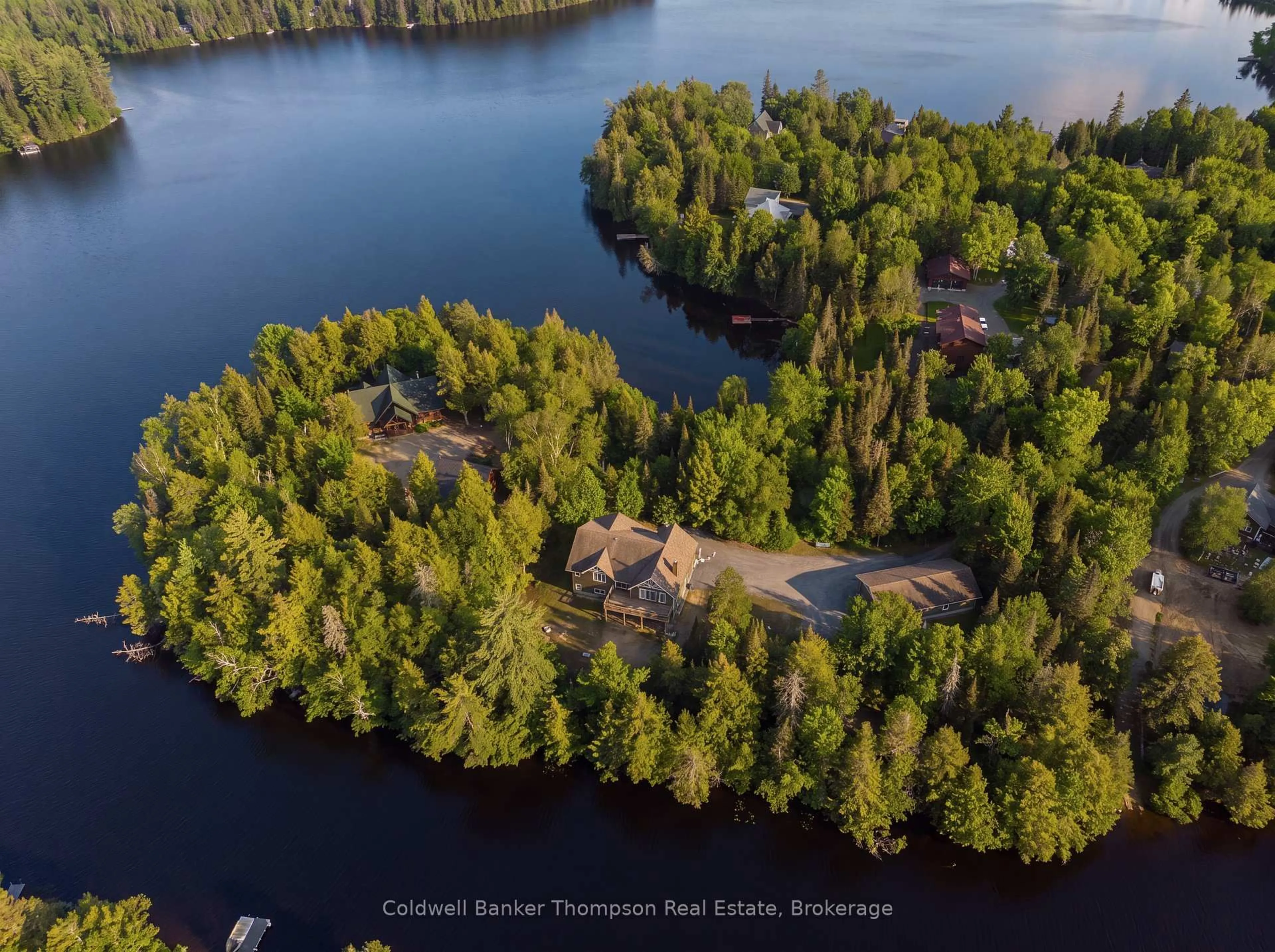 A pic from outside/outdoor area/front of a property/back of a property/a pic from drone, water/lake/river/ocean view for 376 Pinegrove Rd, Perry Ontario P0A 1J0