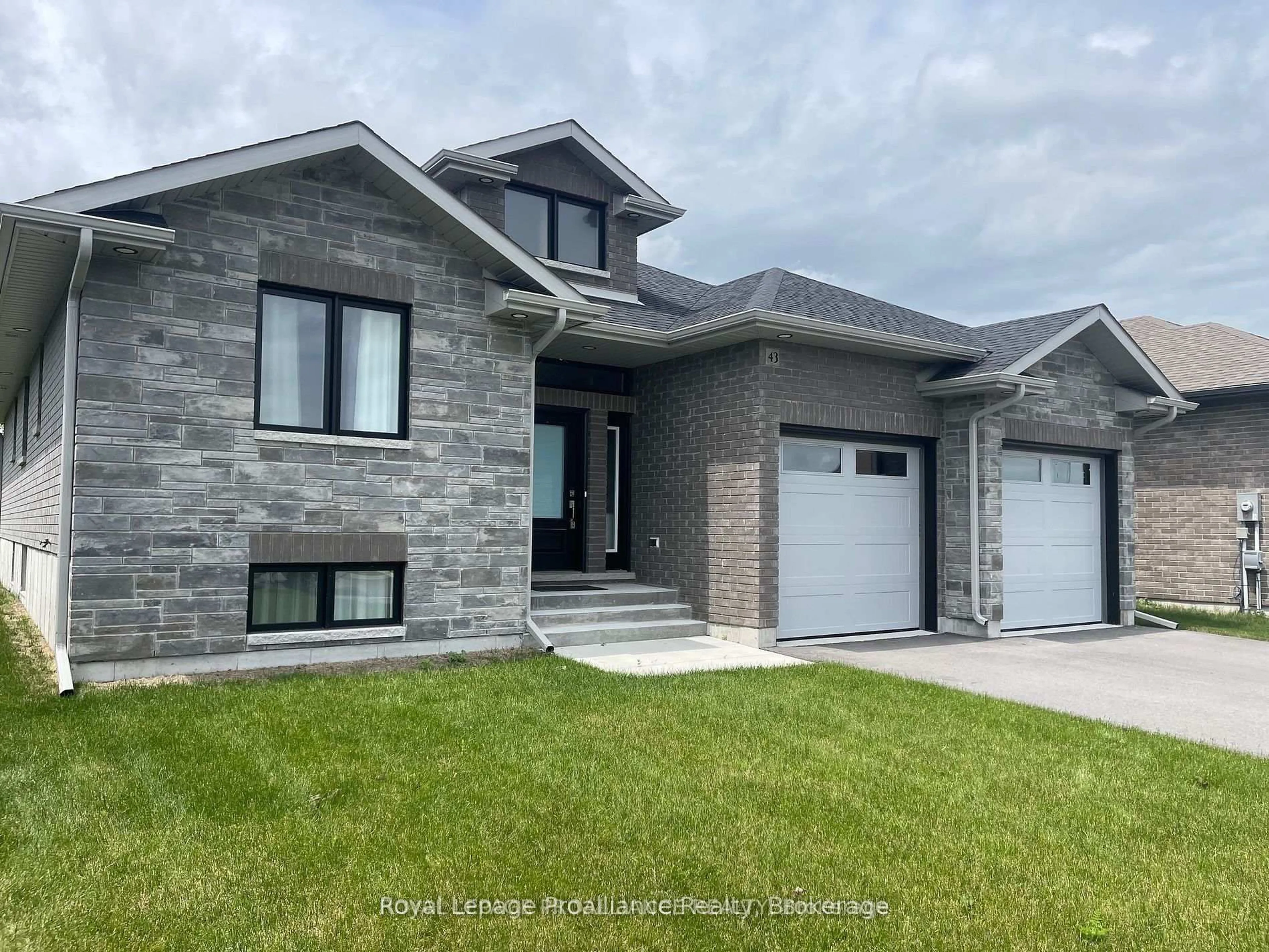 Home with brick exterior material, street for 43 Cattail Cres, Quinte West Ontario K8V 0J3