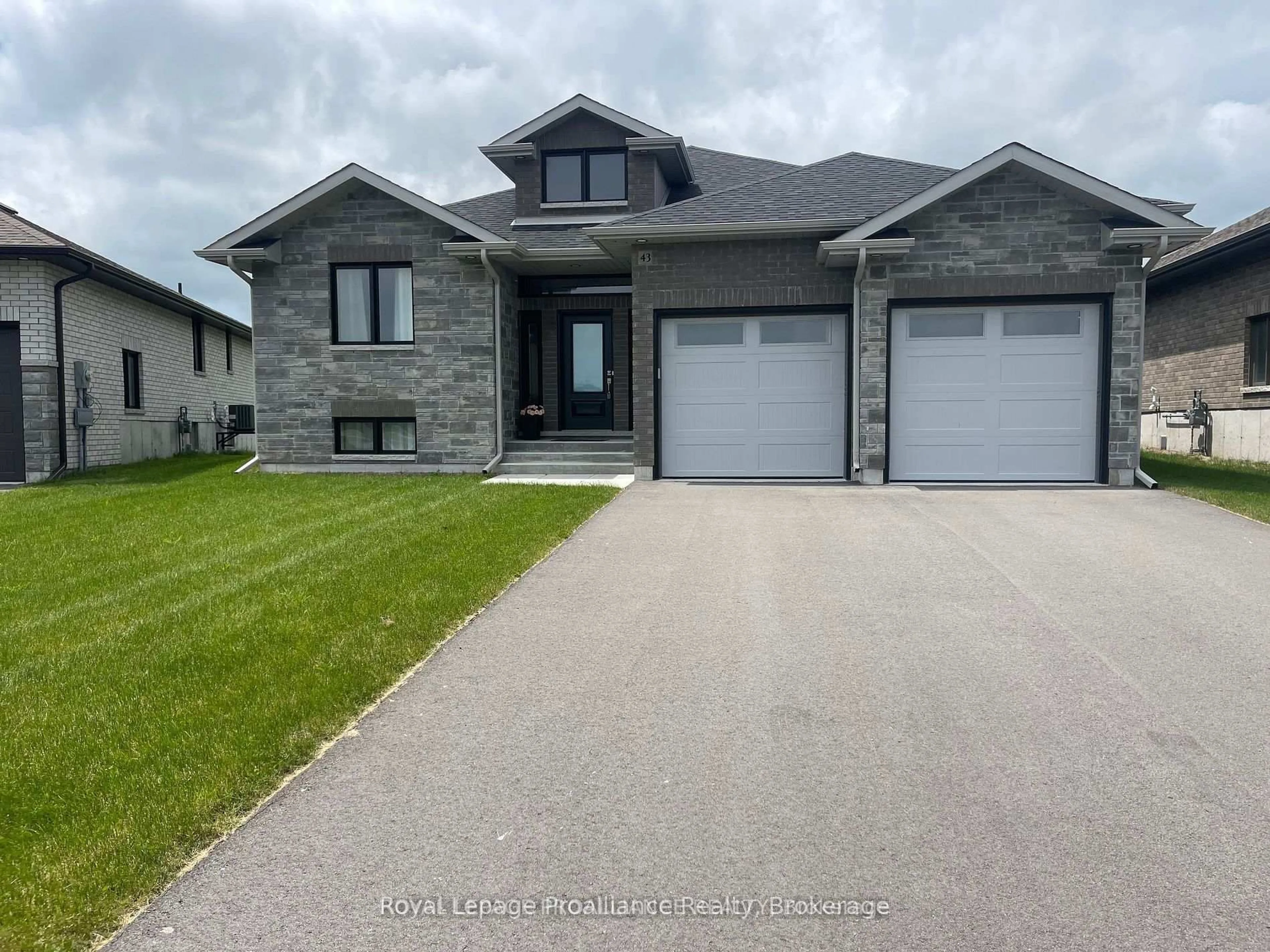 Home with vinyl exterior material, street for 43 Cattail Cres, Quinte West Ontario K8V 0J3