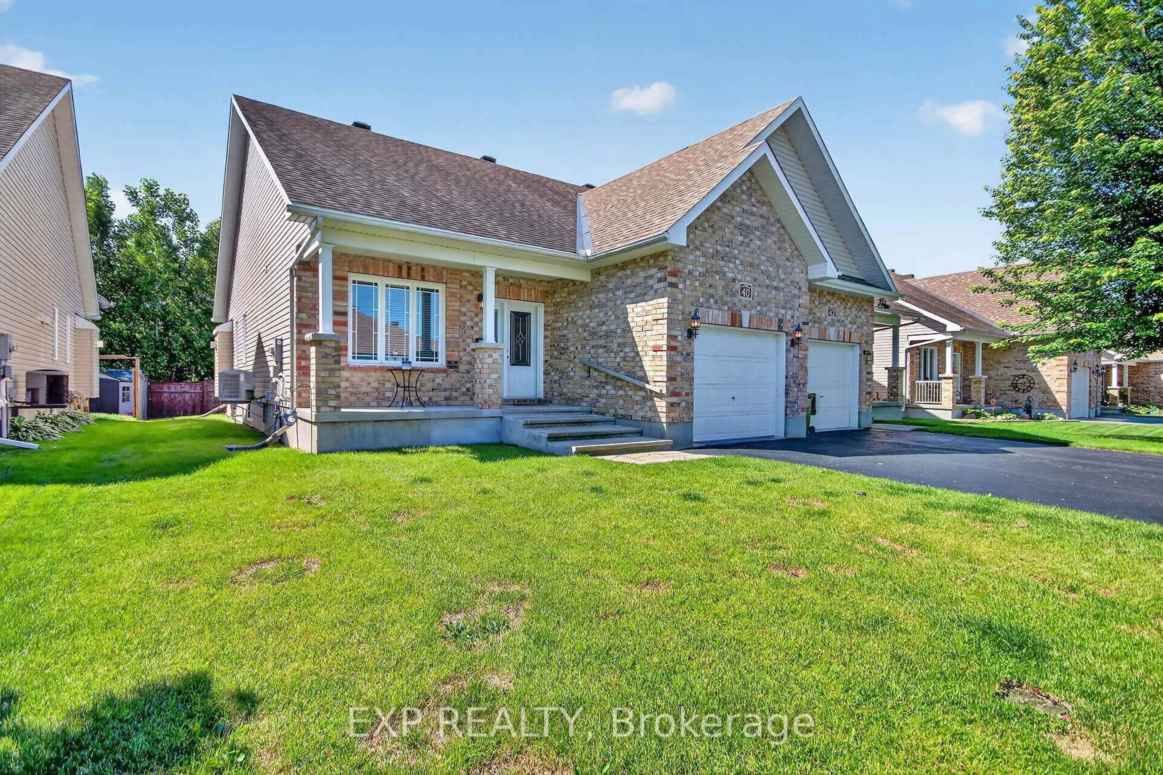 Home with brick exterior material, street for 40 Gaslight Way, Russell Ontario K4R 0B1