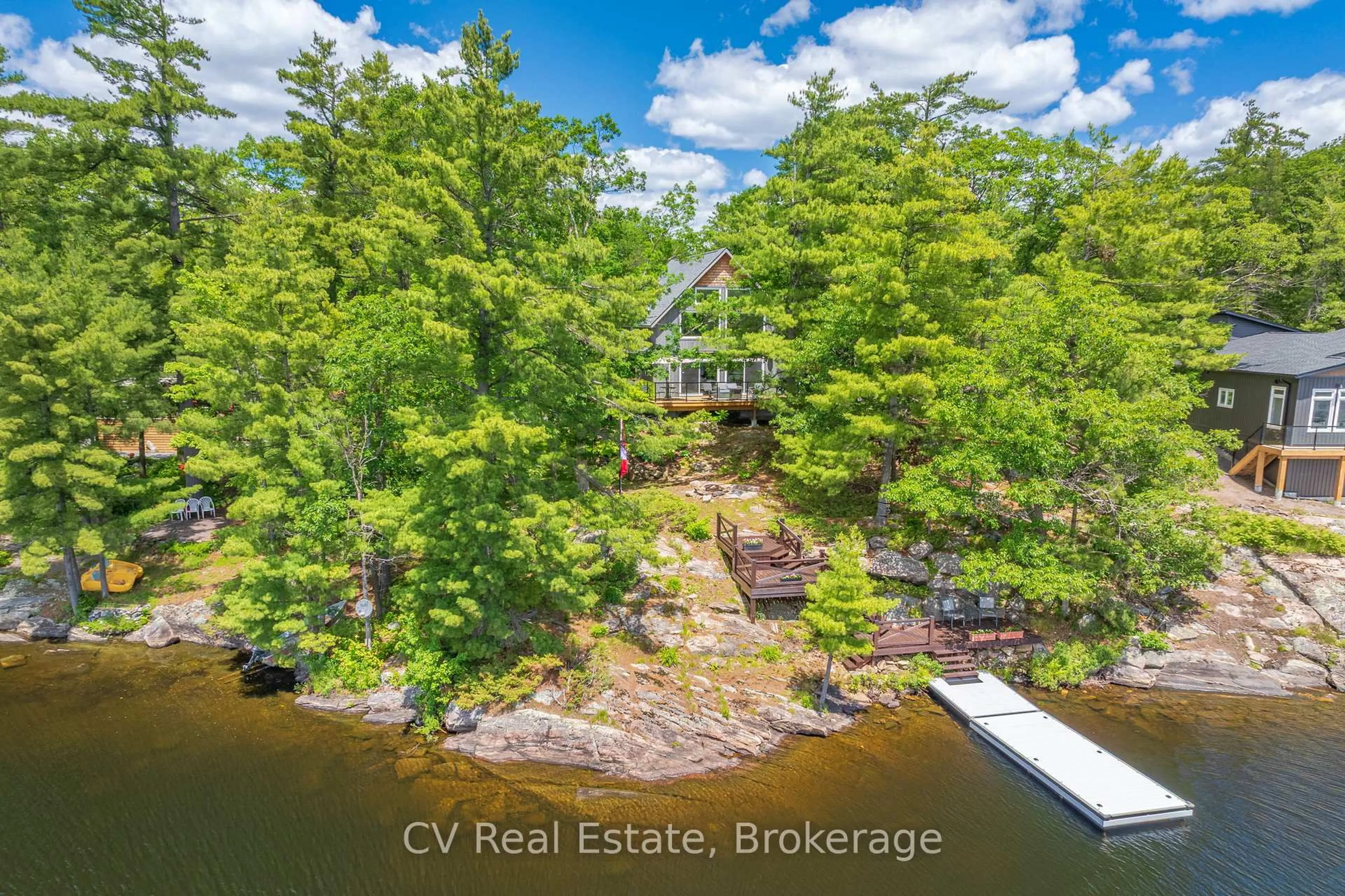 A pic from outside/outdoor area/front of a property/back of a property/a pic from drone, water/lake/river/ocean view for 1028 Marshall Dr, Gravenhurst Ontario P1P 1R2