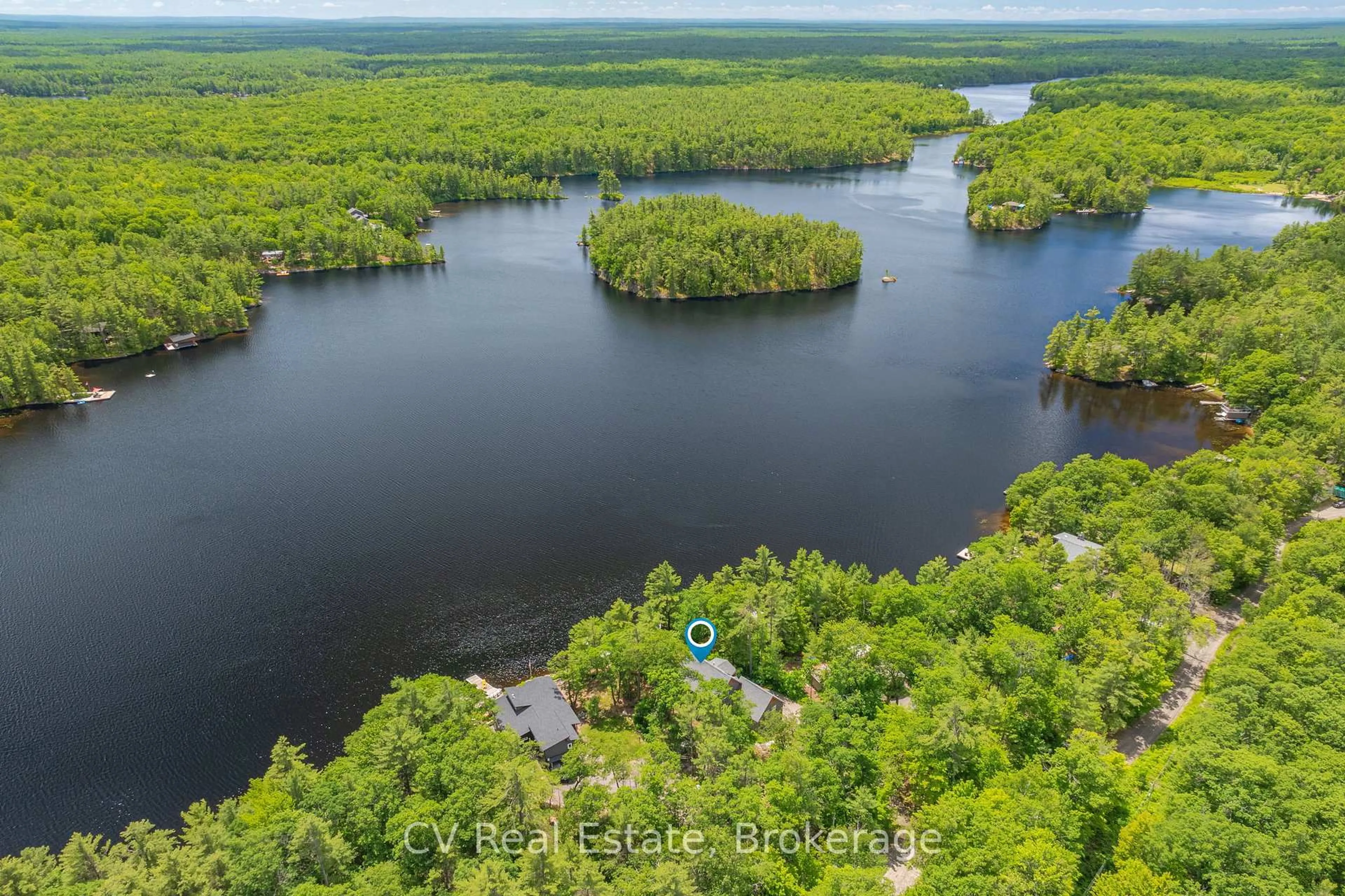 A pic from outside/outdoor area/front of a property/back of a property/a pic from drone, water/lake/river/ocean view for 1028 Marshall Dr, Gravenhurst Ontario P1P 1R2