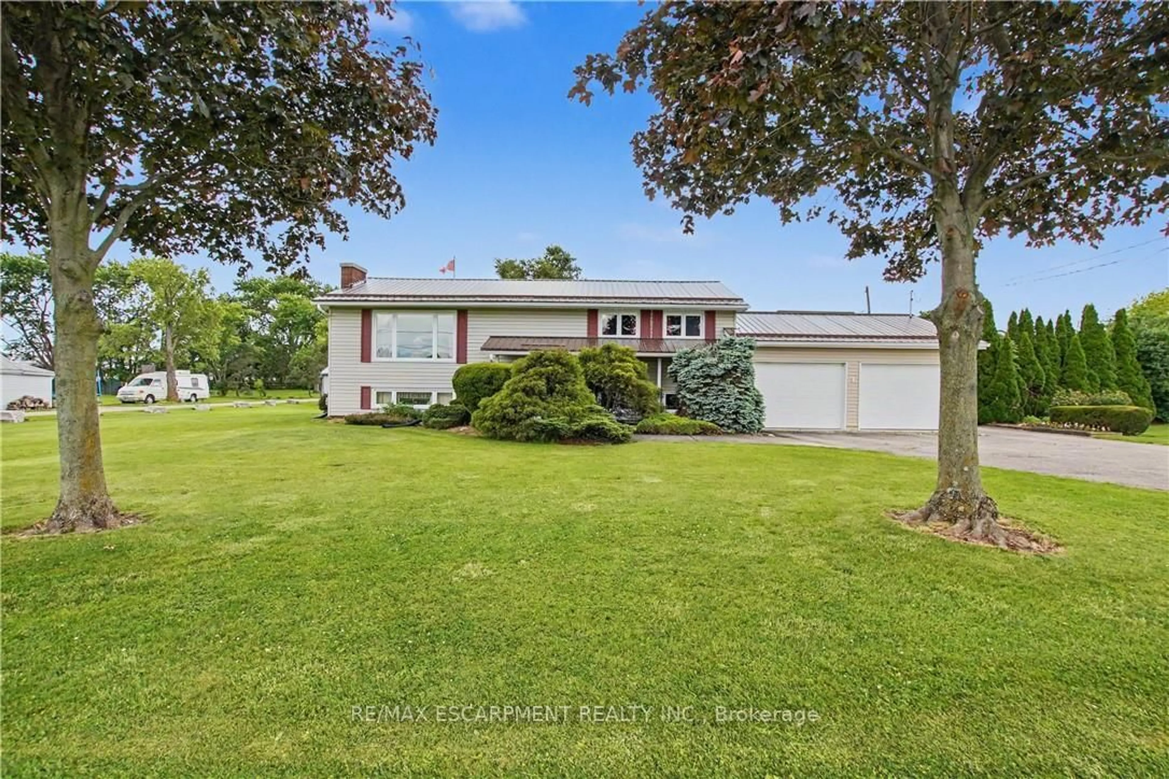 A pic from outside/outdoor area/front of a property/back of a property/a pic from drone, unknown for 5 Unity Side Rd, Haldimand Ontario N3W 1Y1