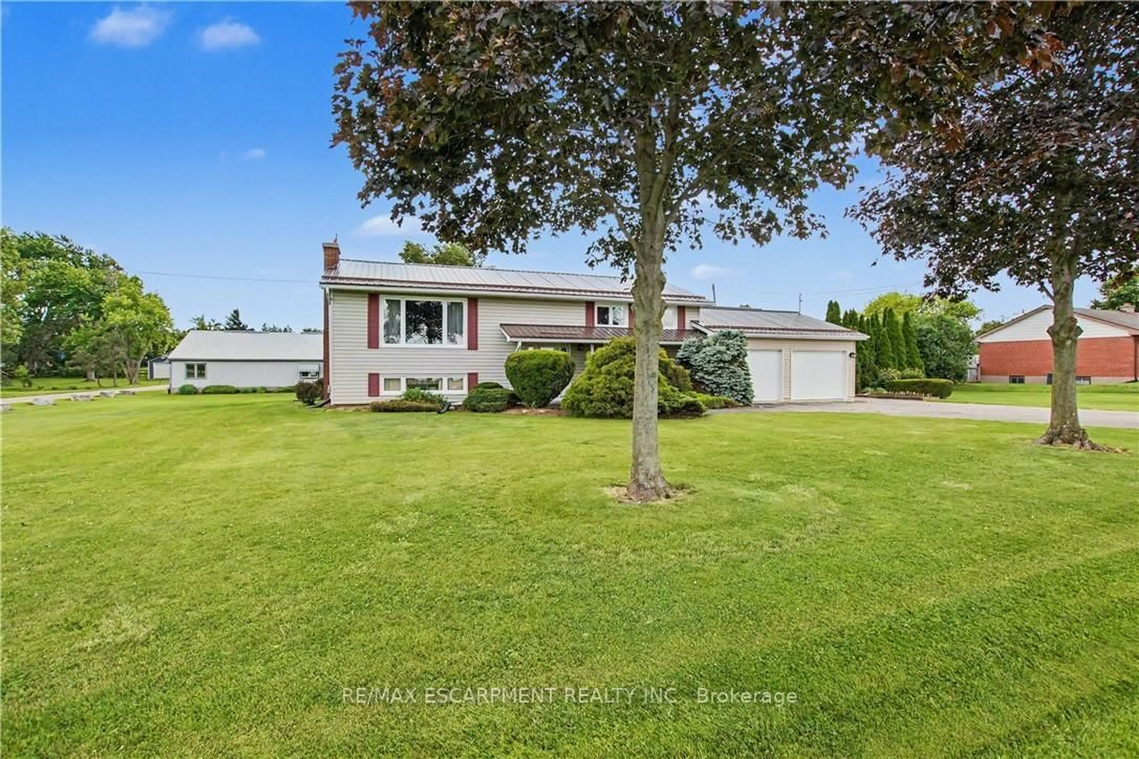 A pic from outside/outdoor area/front of a property/back of a property/a pic from drone, unknown for 5 Unity Side Rd, Haldimand Ontario N3W 1Y1